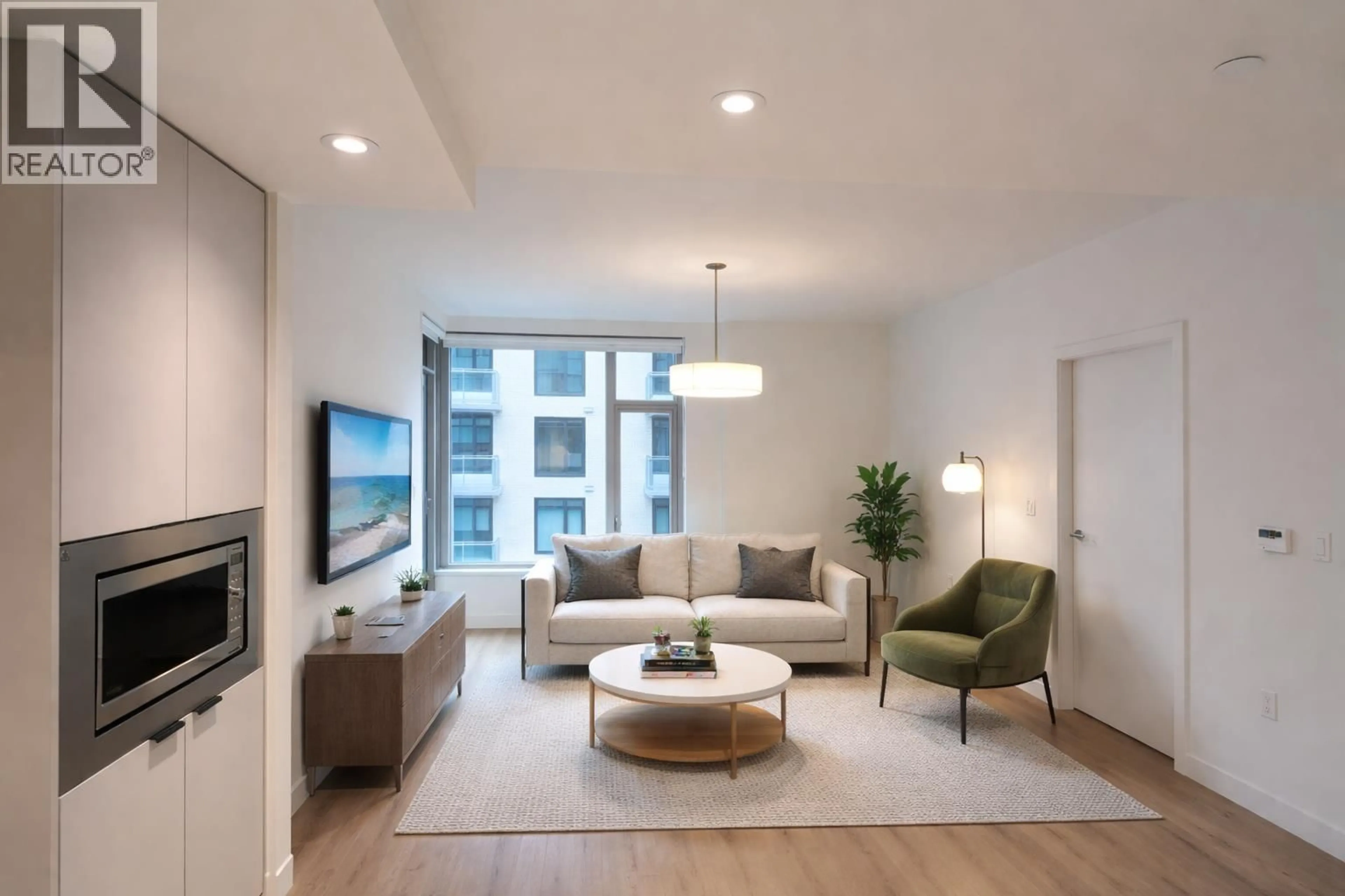 Living room with furniture, unknown for 425 - 755 HARBOURSIDE DRIVE, North Vancouver British Columbia V7P0G1