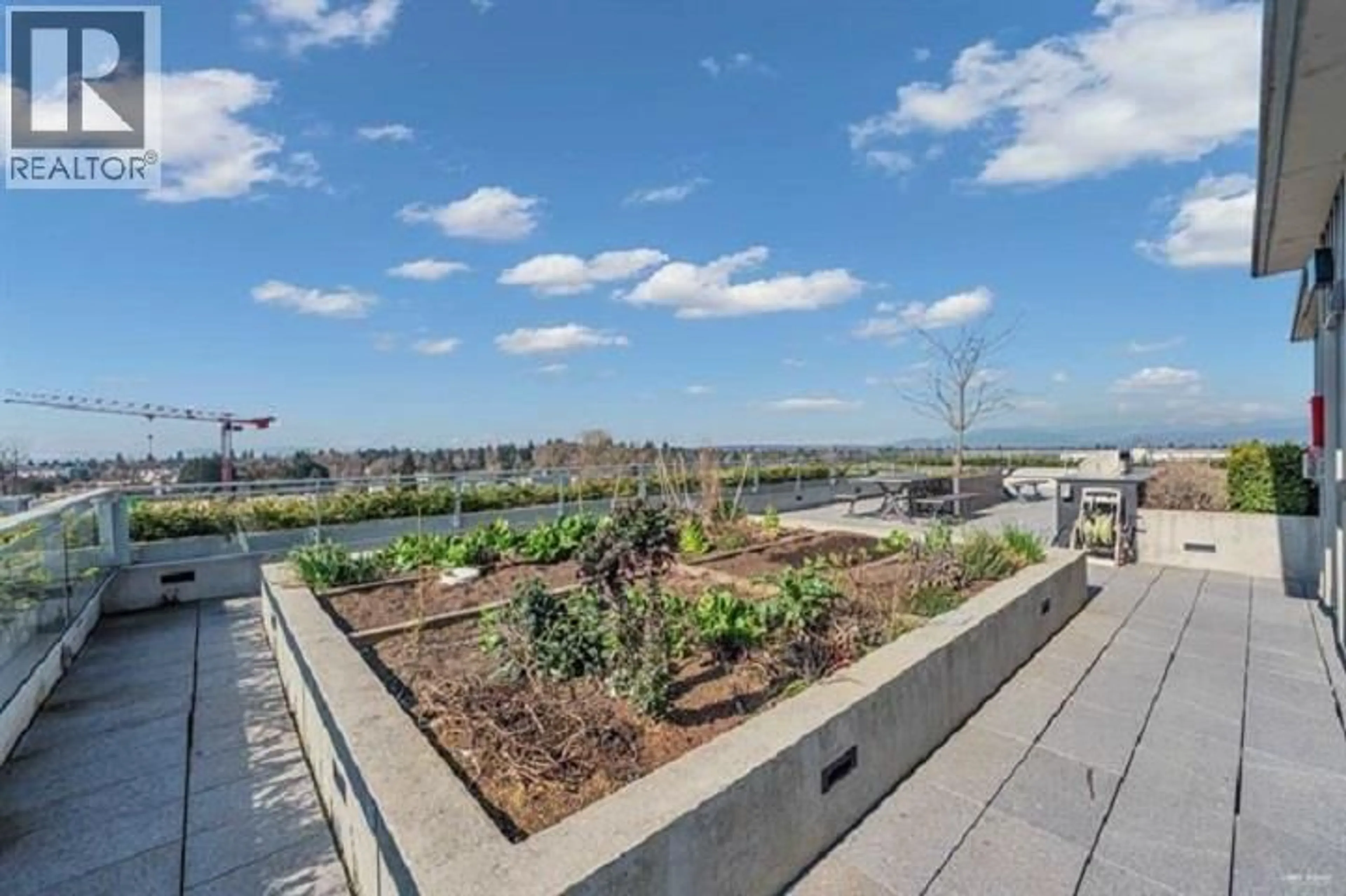 Patio, city buildings view from balcony for 102 - 4988 CAMBIE STREET, Vancouver British Columbia V5Z2Z5