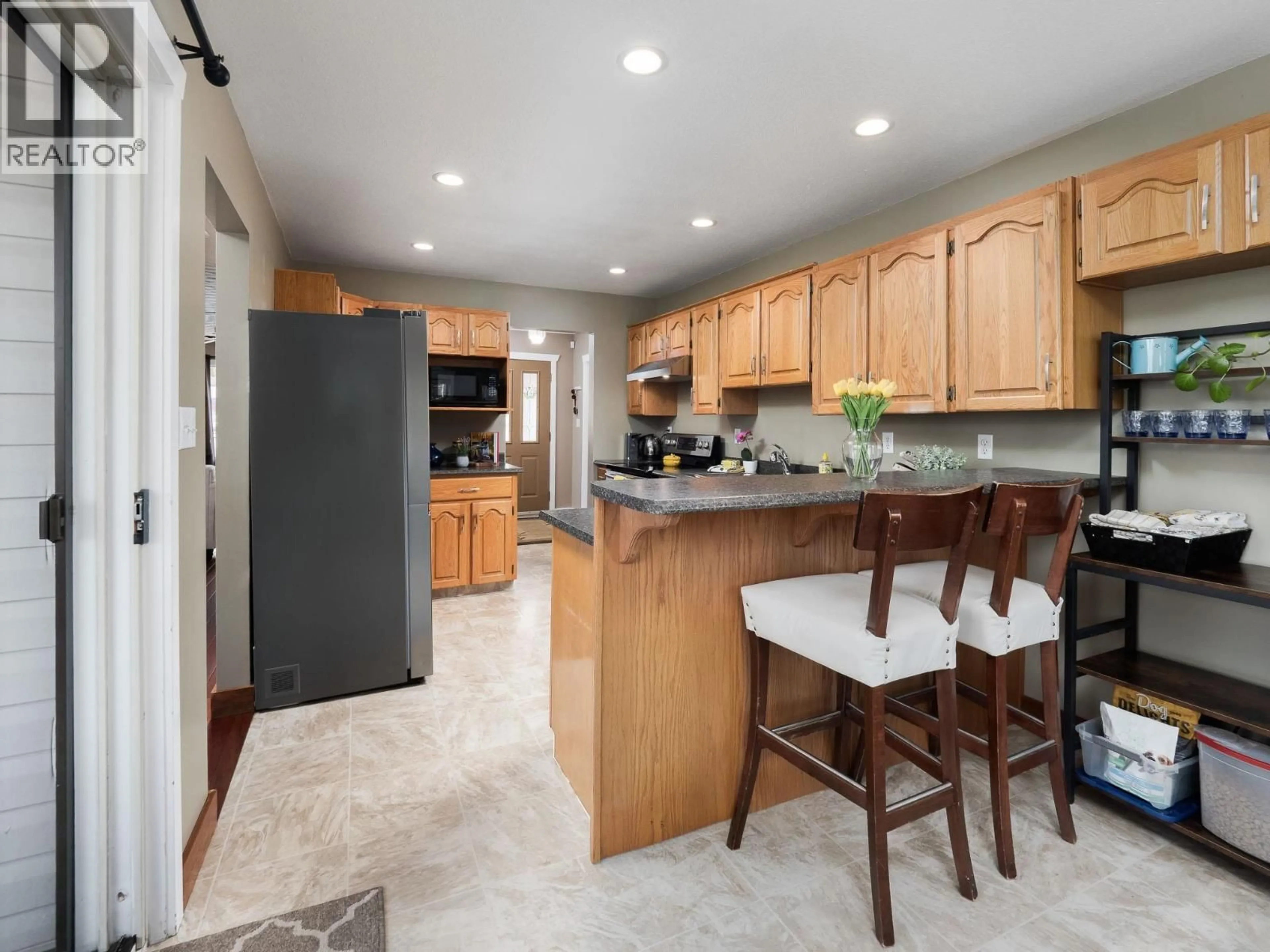 Open concept kitchen, ceramic/tile floor for 3449 CLEARWOOD PLACE, Prince George British Columbia V2K4R1