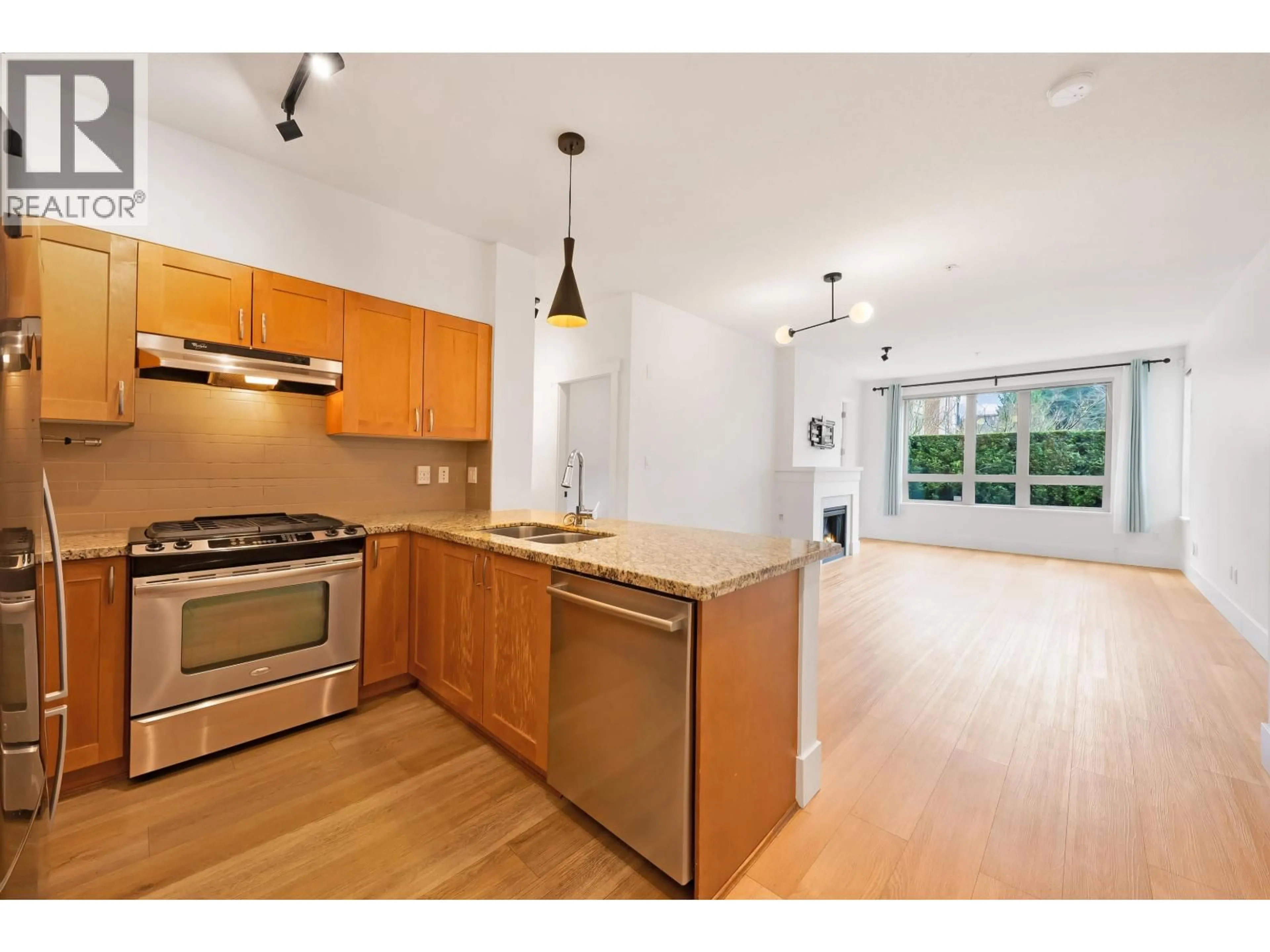 Open concept kitchen, unknown for 103 - 1111 27TH STREET, North Vancouver British Columbia V7J1S3