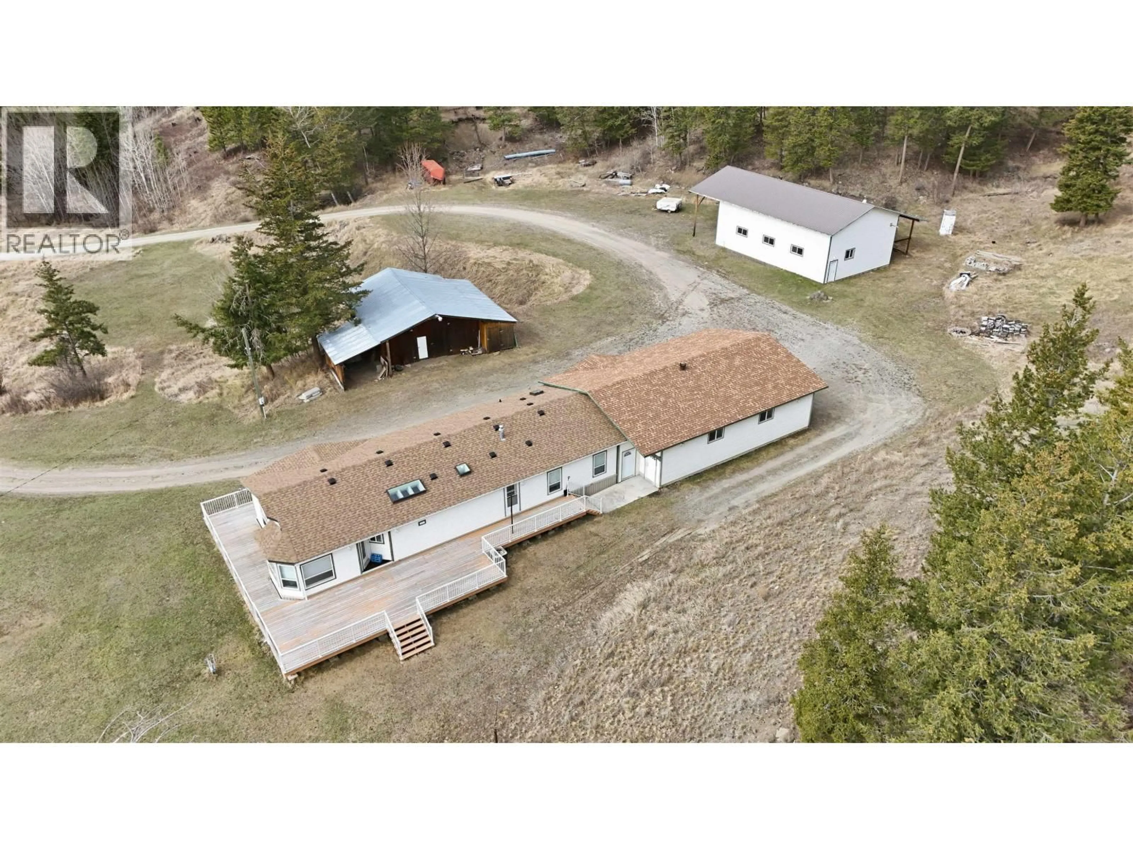 A pic from outside/outdoor area/front of a property/back of a property/a pic from drone, building for 97 VALLEY ROAD, 150 Mile House British Columbia V0K2G0