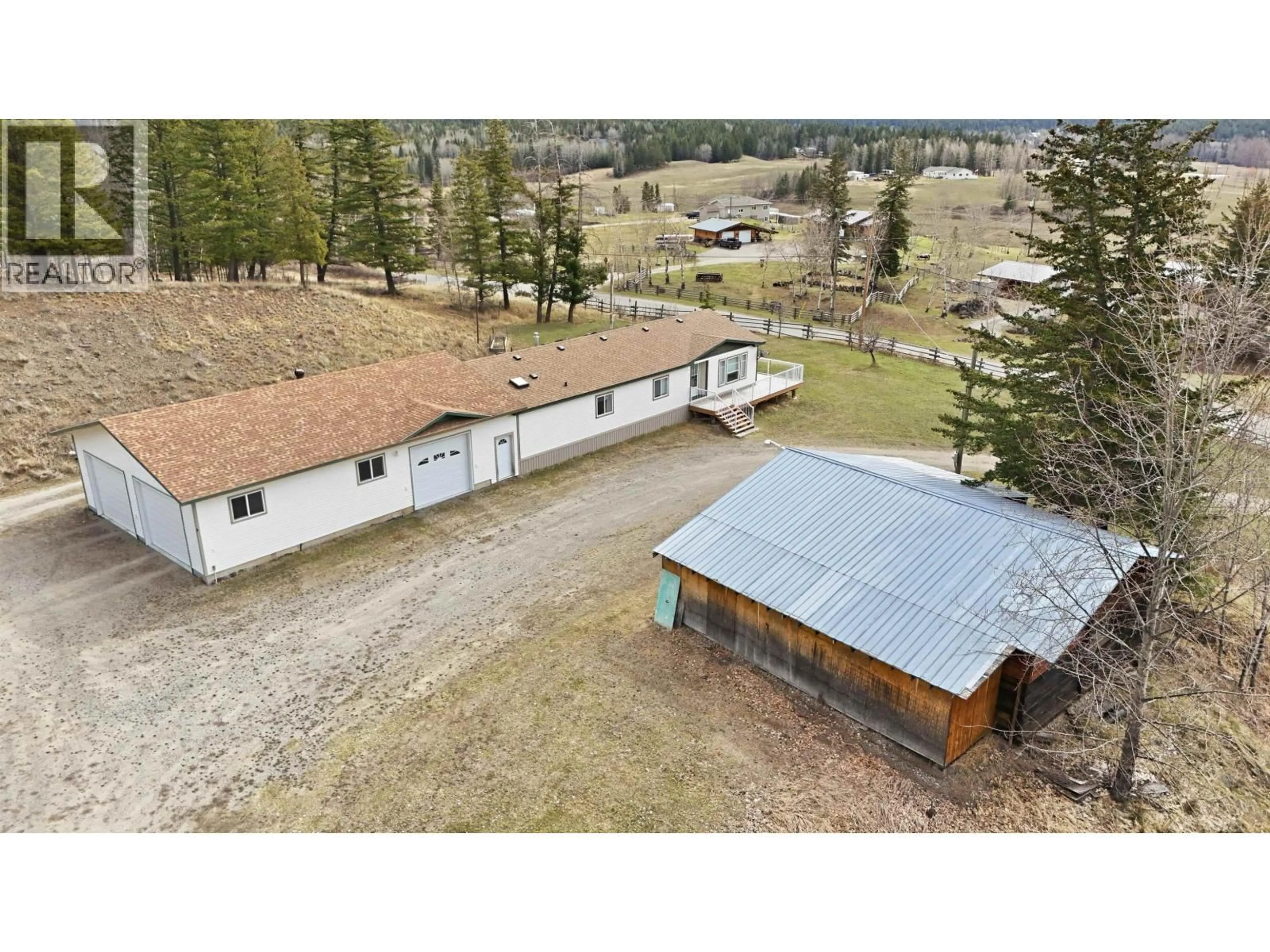 A pic from outside/outdoor area/front of a property/back of a property/a pic from drone, unknown for 97 VALLEY ROAD, 150 Mile House British Columbia V0K2G0