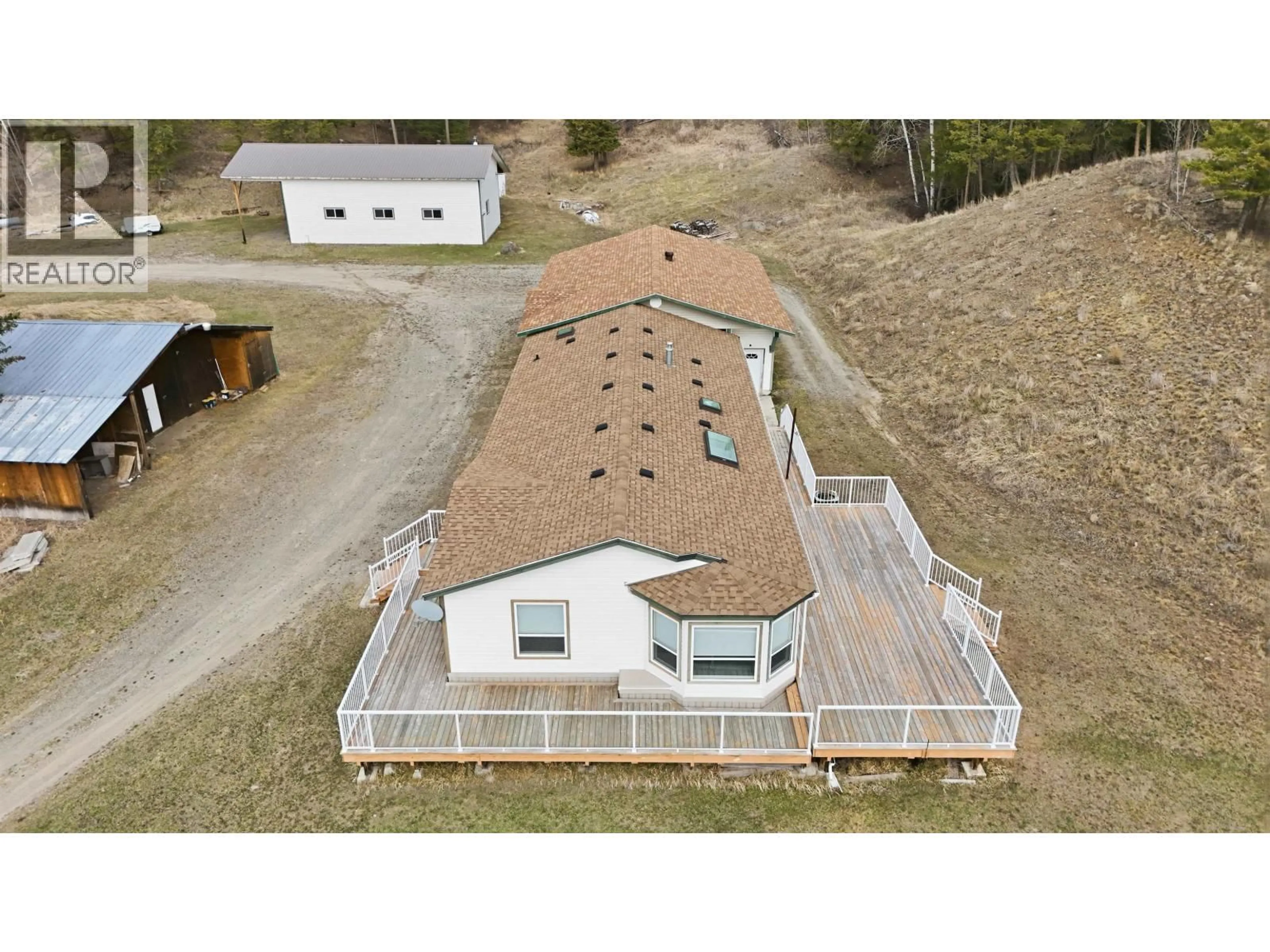A pic from outside/outdoor area/front of a property/back of a property/a pic from drone, building for 97 VALLEY ROAD, 150 Mile House British Columbia V0K2G0