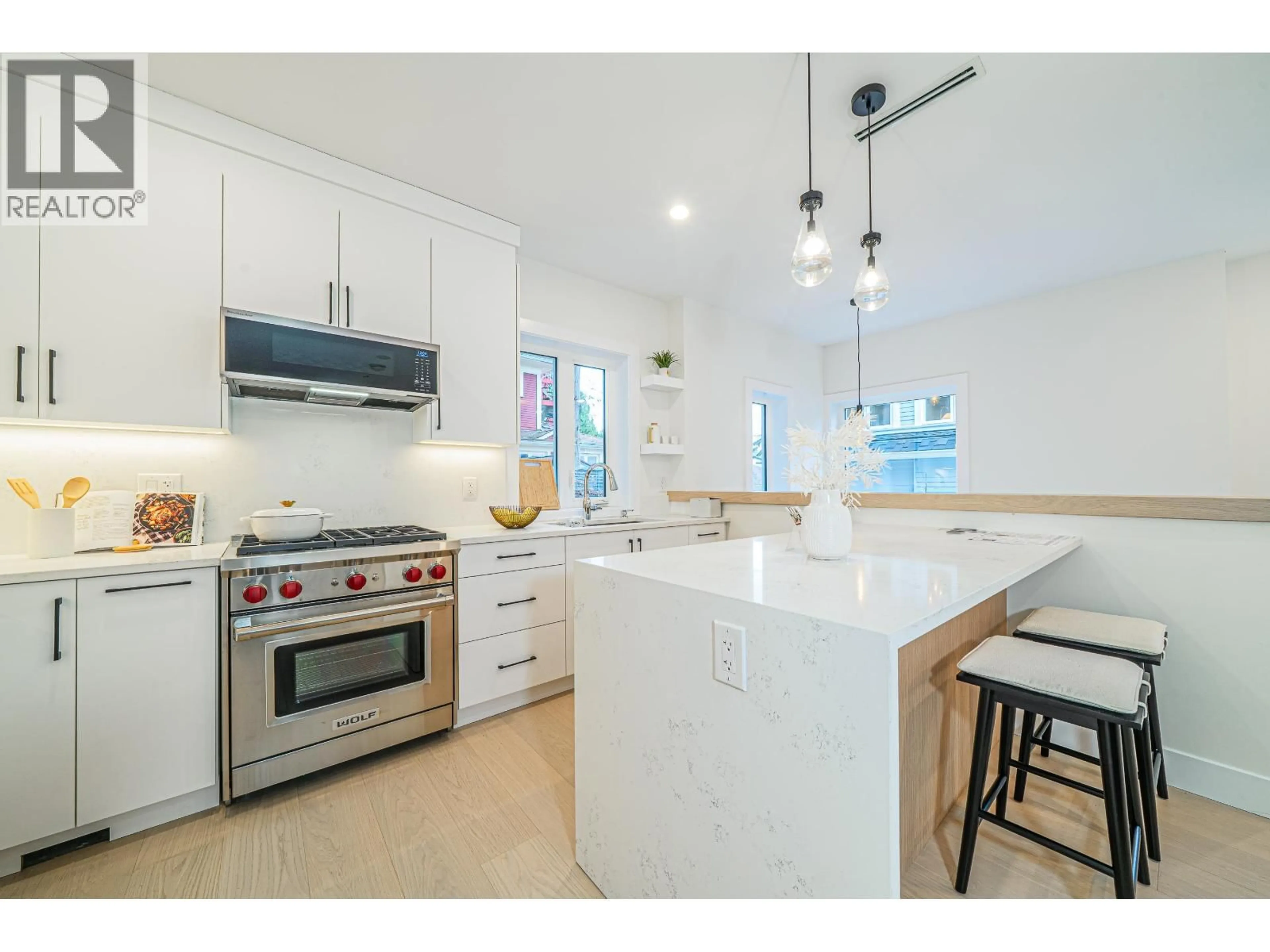 Open concept kitchen, ceramic/tile floor for 1924 WILLIAM STREET, Vancouver British Columbia V5L2R8