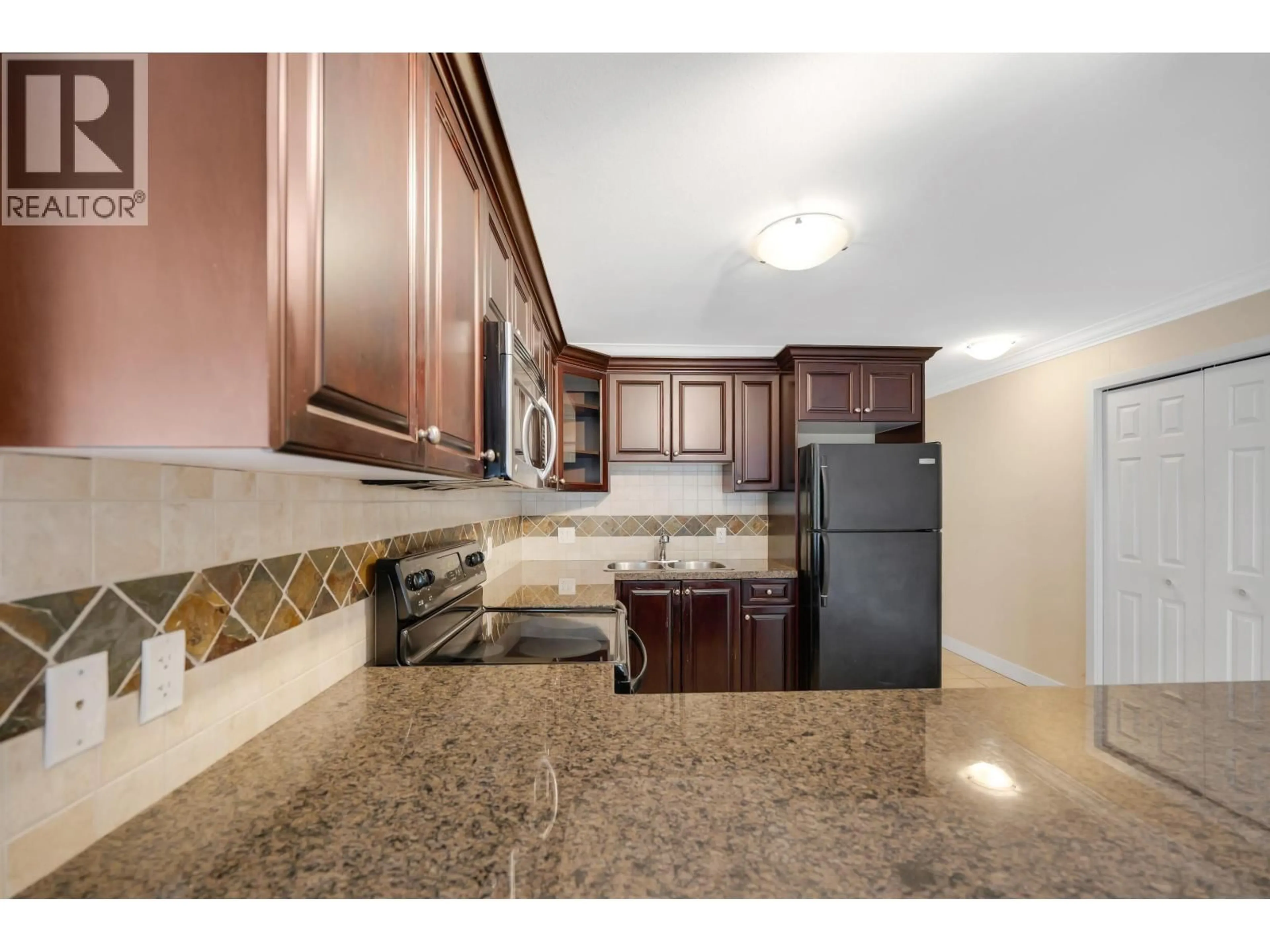 Standard kitchen, ceramic/tile floor for 403 - 1310 VICTORIA STREET, Squamish British Columbia V0N3G0