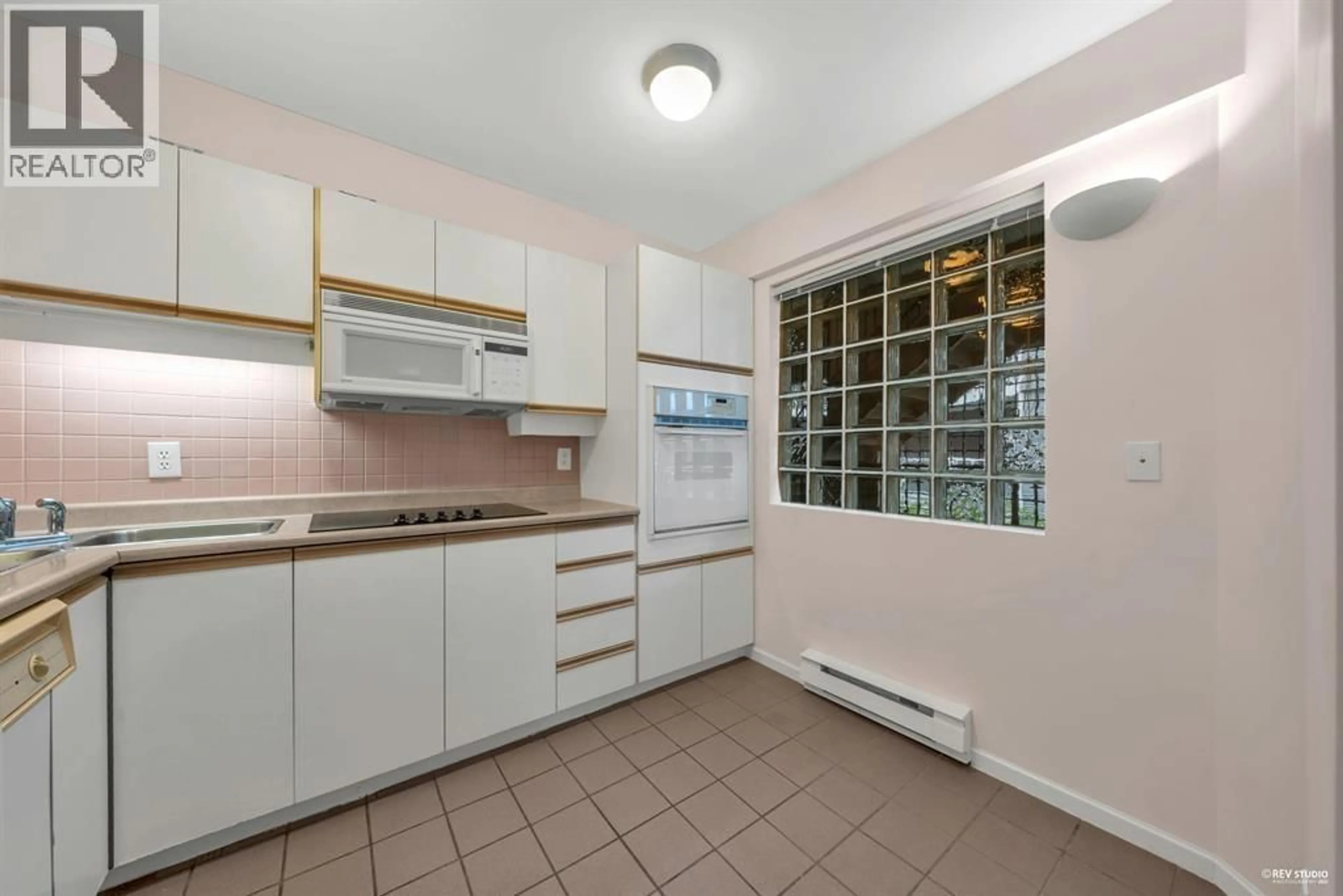 Standard kitchen, ceramic/tile floor for 201 - 4688 10TH AVENUE, Vancouver British Columbia V6R2J5