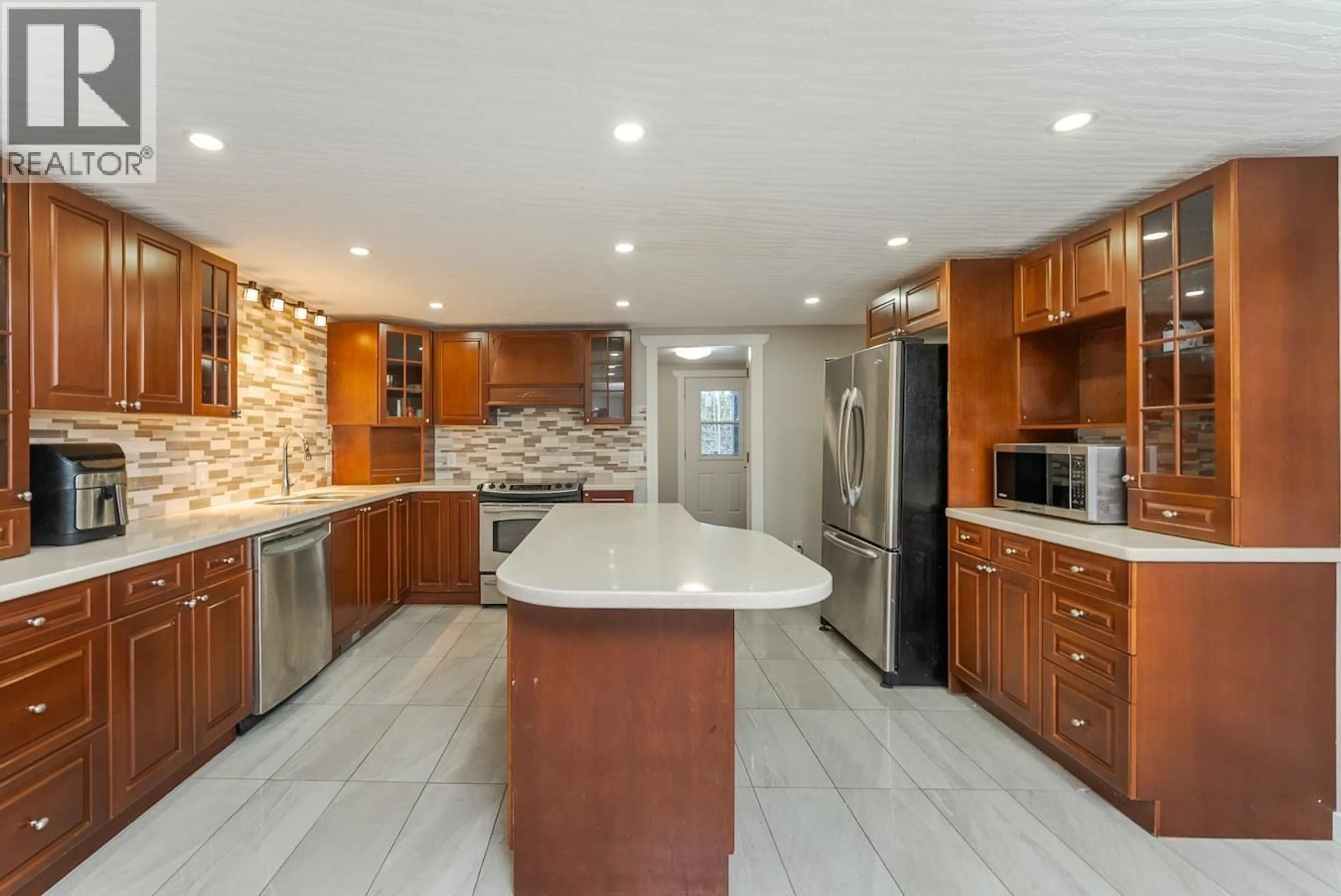 Open concept kitchen, ceramic/tile floor for 6315 CUMMINGS ROAD, Prince George British Columbia V2N5W1