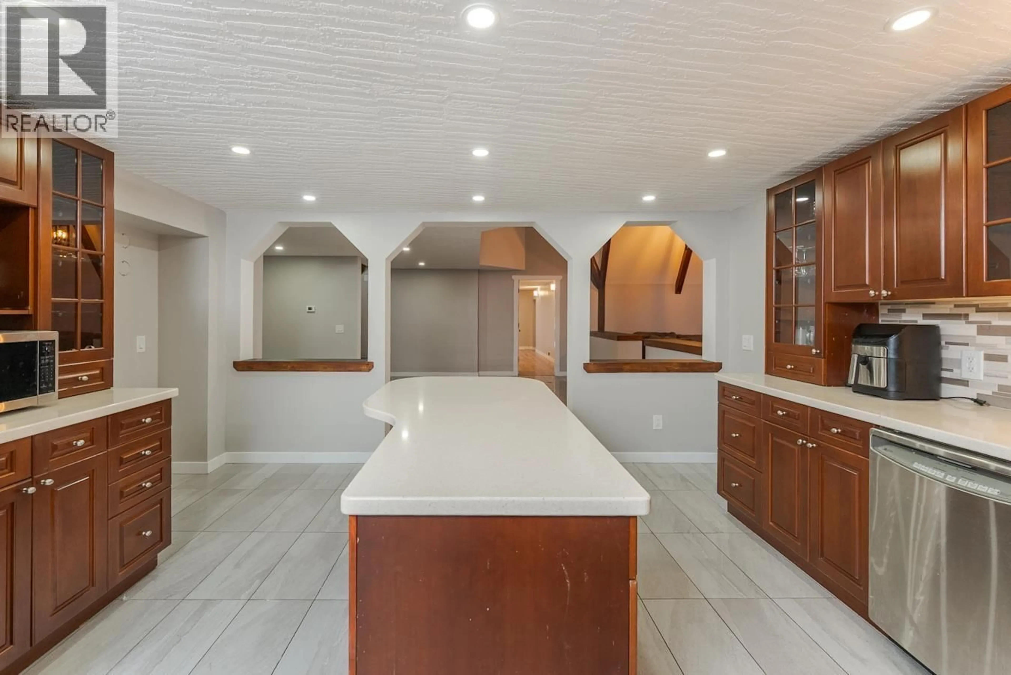 Open concept kitchen, ceramic/tile floor for 6315 CUMMINGS ROAD, Prince George British Columbia V2N5W1