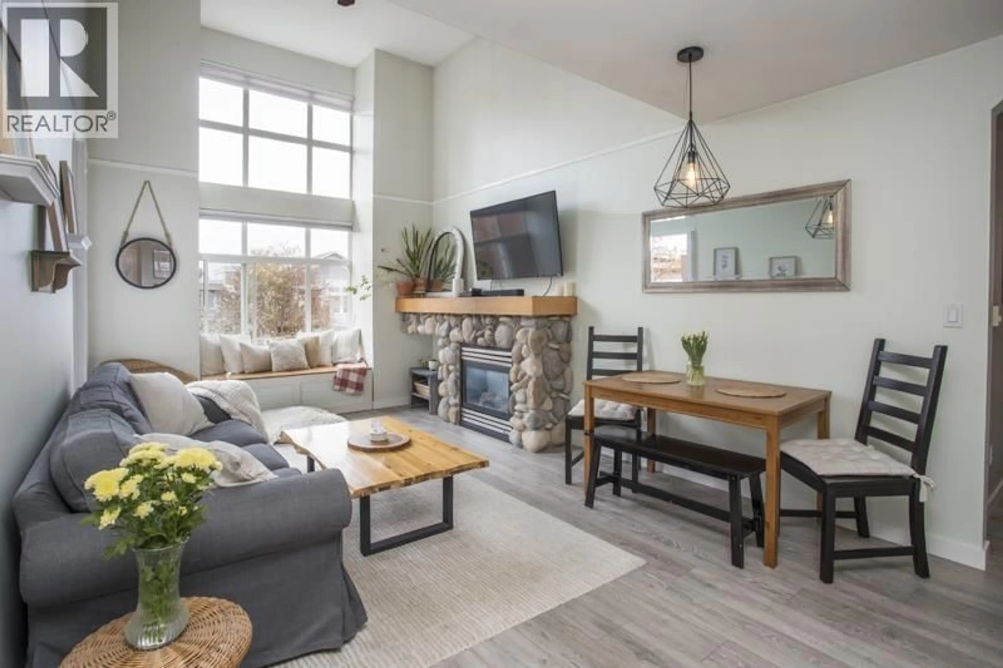 Living room with furniture, unknown for 427 - 5700 ANDREWS ROAD, Richmond British Columbia V7E6N7