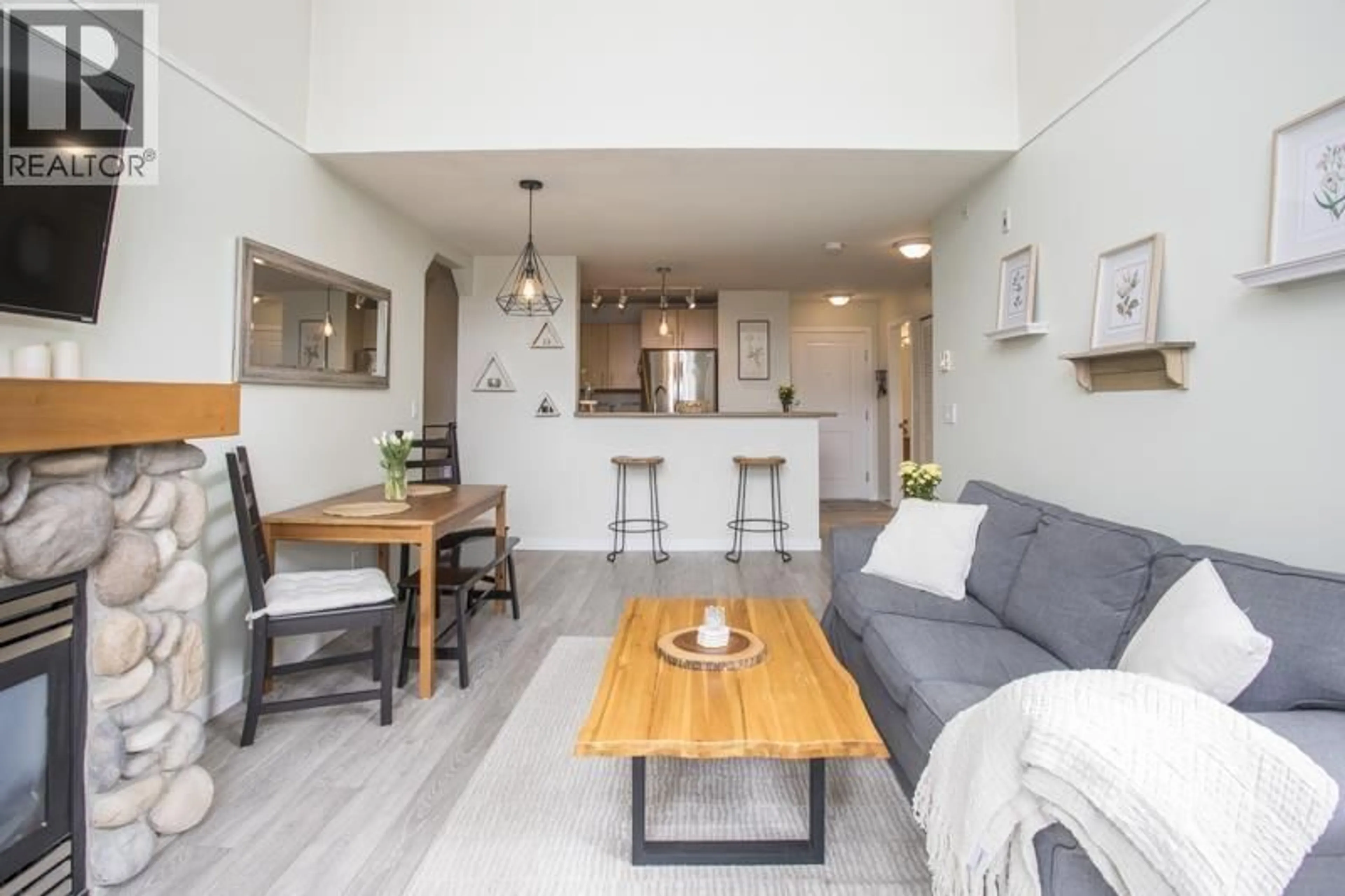 Living room with furniture, unknown for 427 - 5700 ANDREWS ROAD, Richmond British Columbia V7E6N7