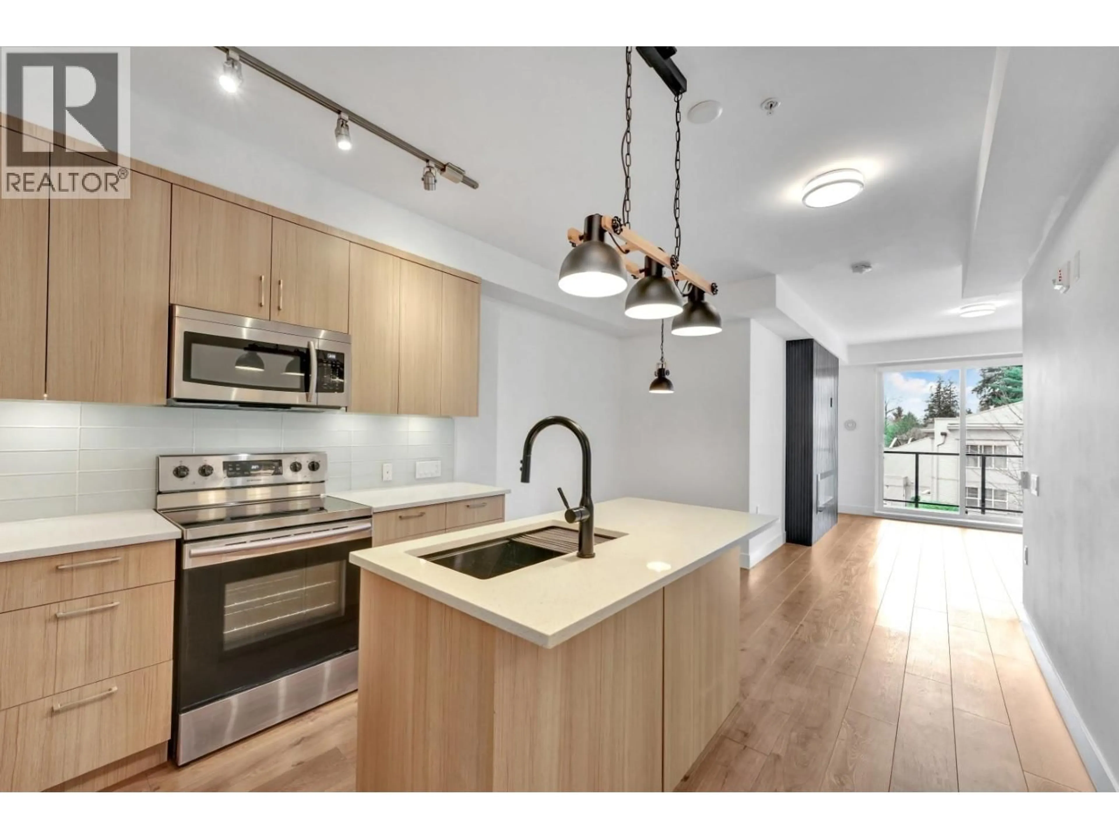 Open concept kitchen, unknown for 304 - 12460 191 STREET, Pitt Meadows British Columbia V3Y2J2