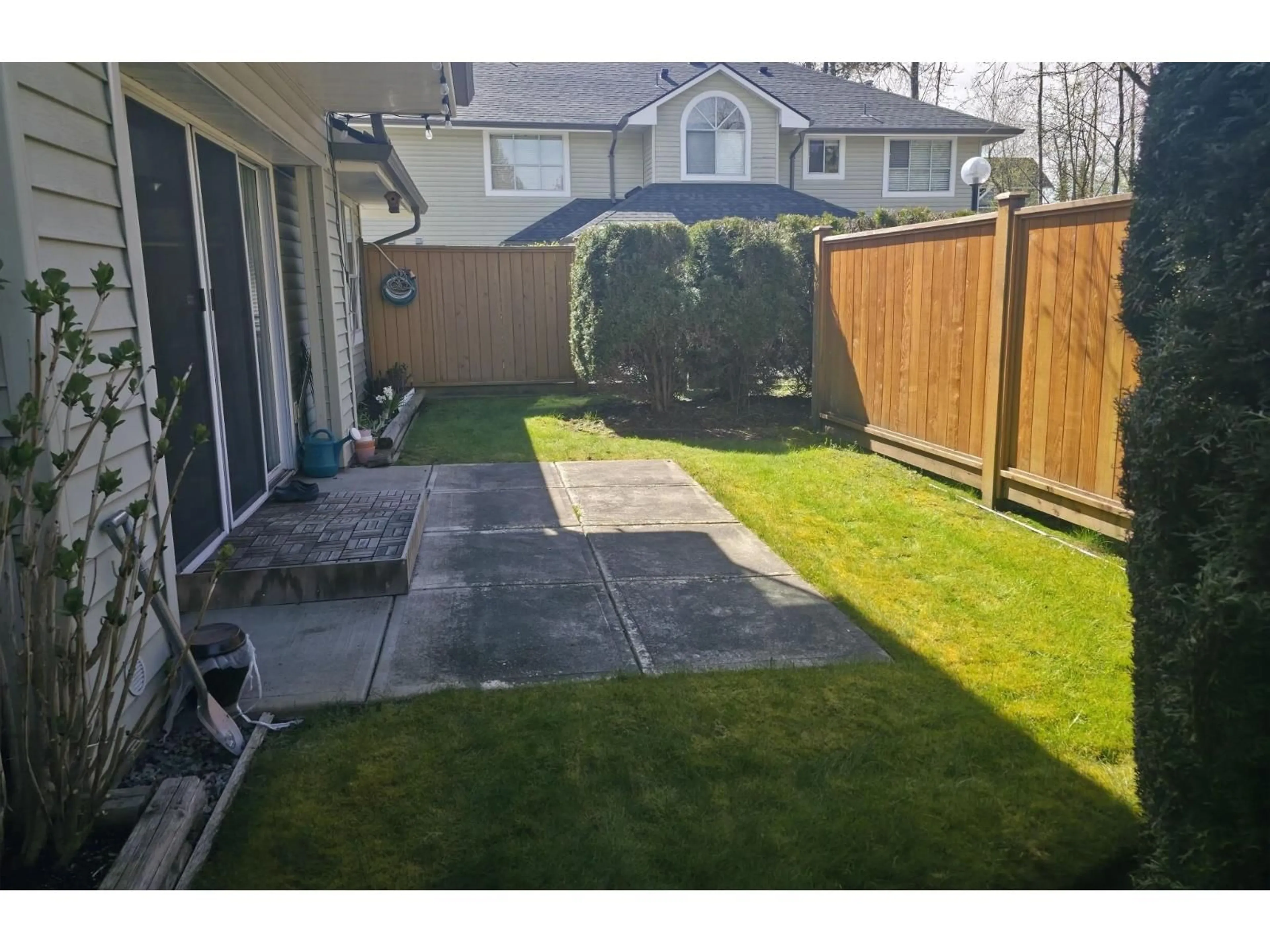 A pic from outside/outdoor area/front of a property/back of a property/a pic from drone, street for 103 - 15439 100 AVENUE, Surrey British Columbia V3R0K4