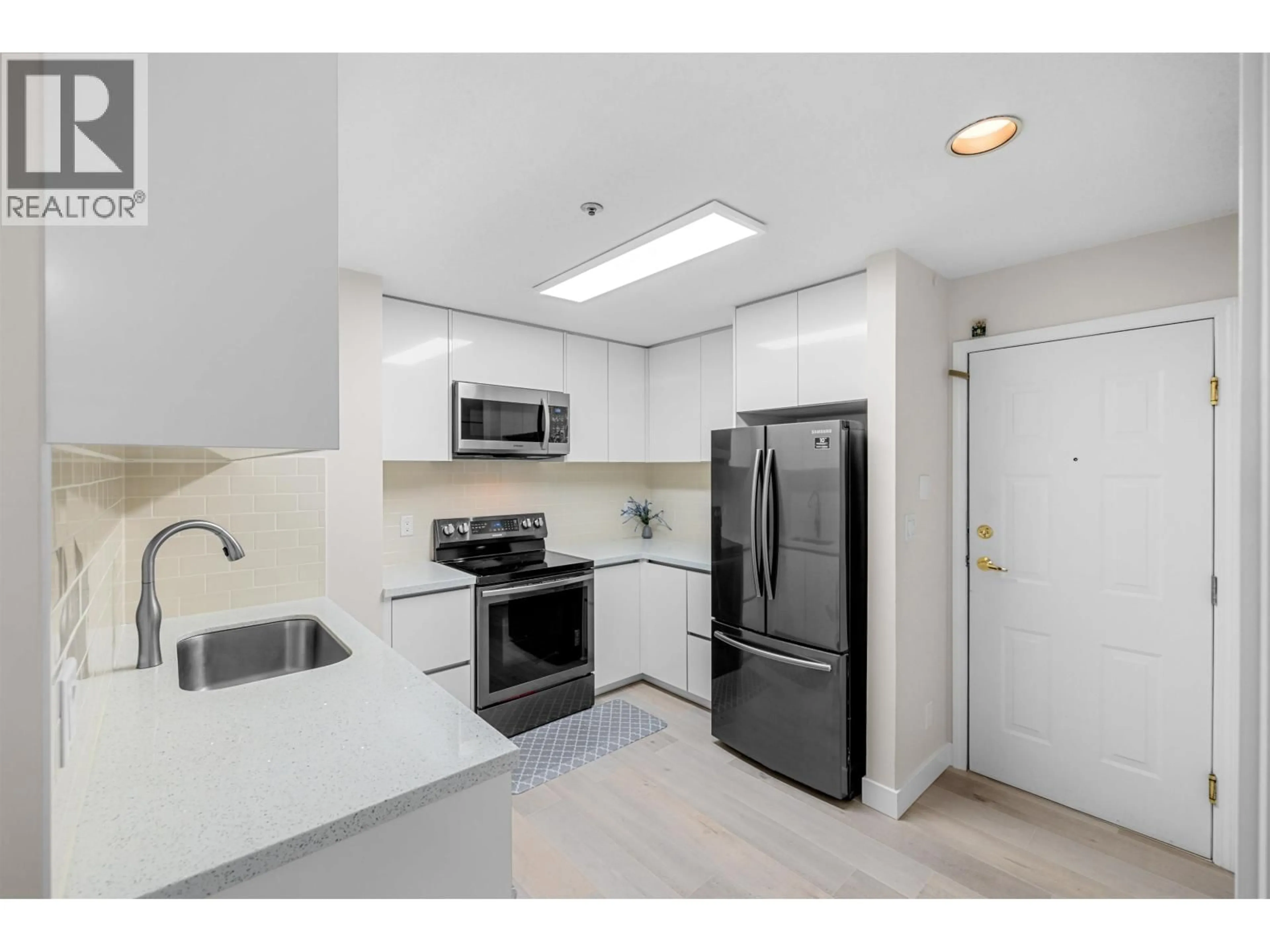 Standard kitchen, ceramic/tile floor for 206 - 3668 RAE AVENUE, Vancouver British Columbia V5R6A7