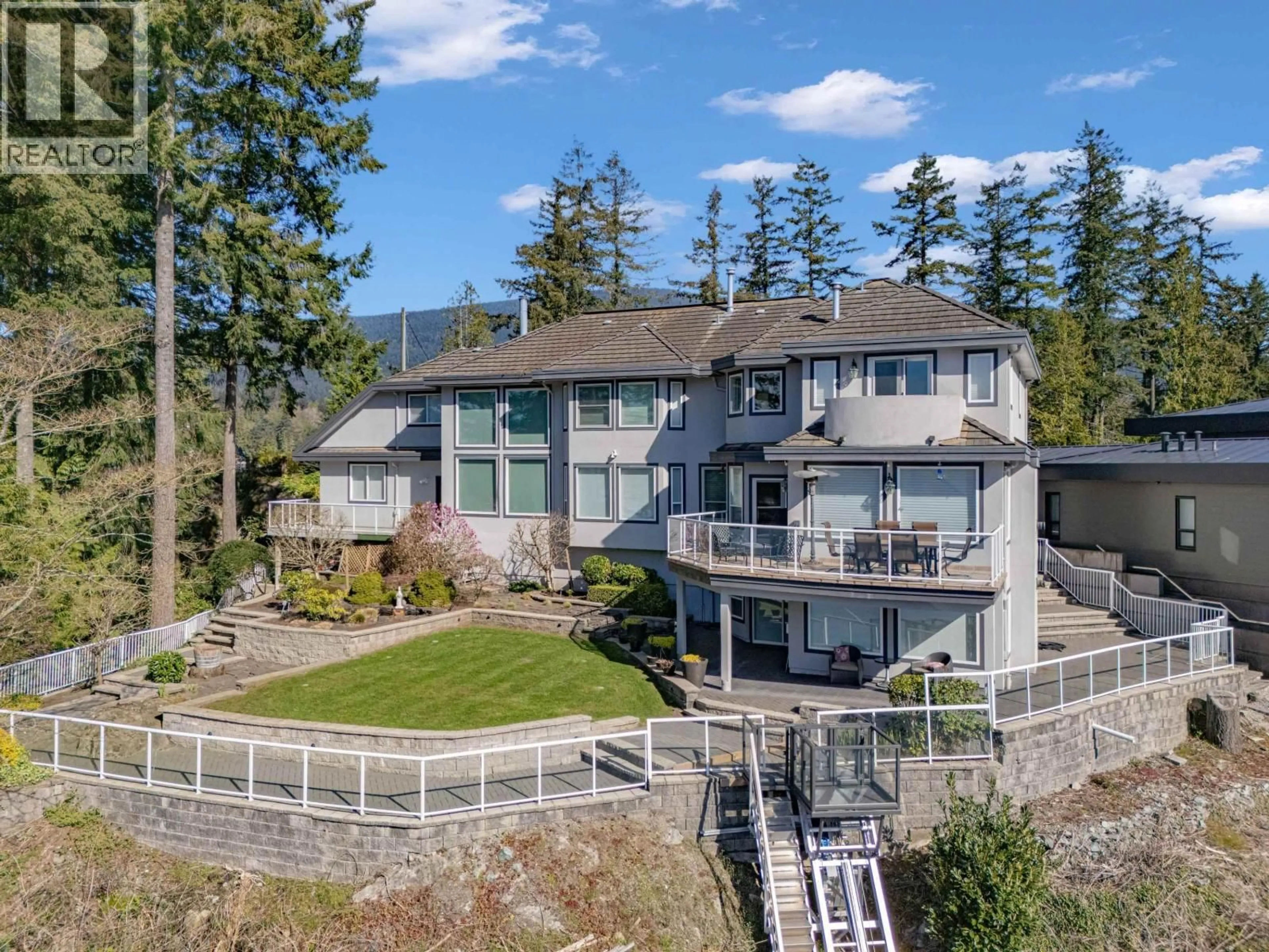A pic from outside/outdoor area/front of a property/back of a property/a pic from drone, water/lake/river/ocean view for 242 TURTLEHEAD ROAD, Belcarra British Columbia V3H4P2