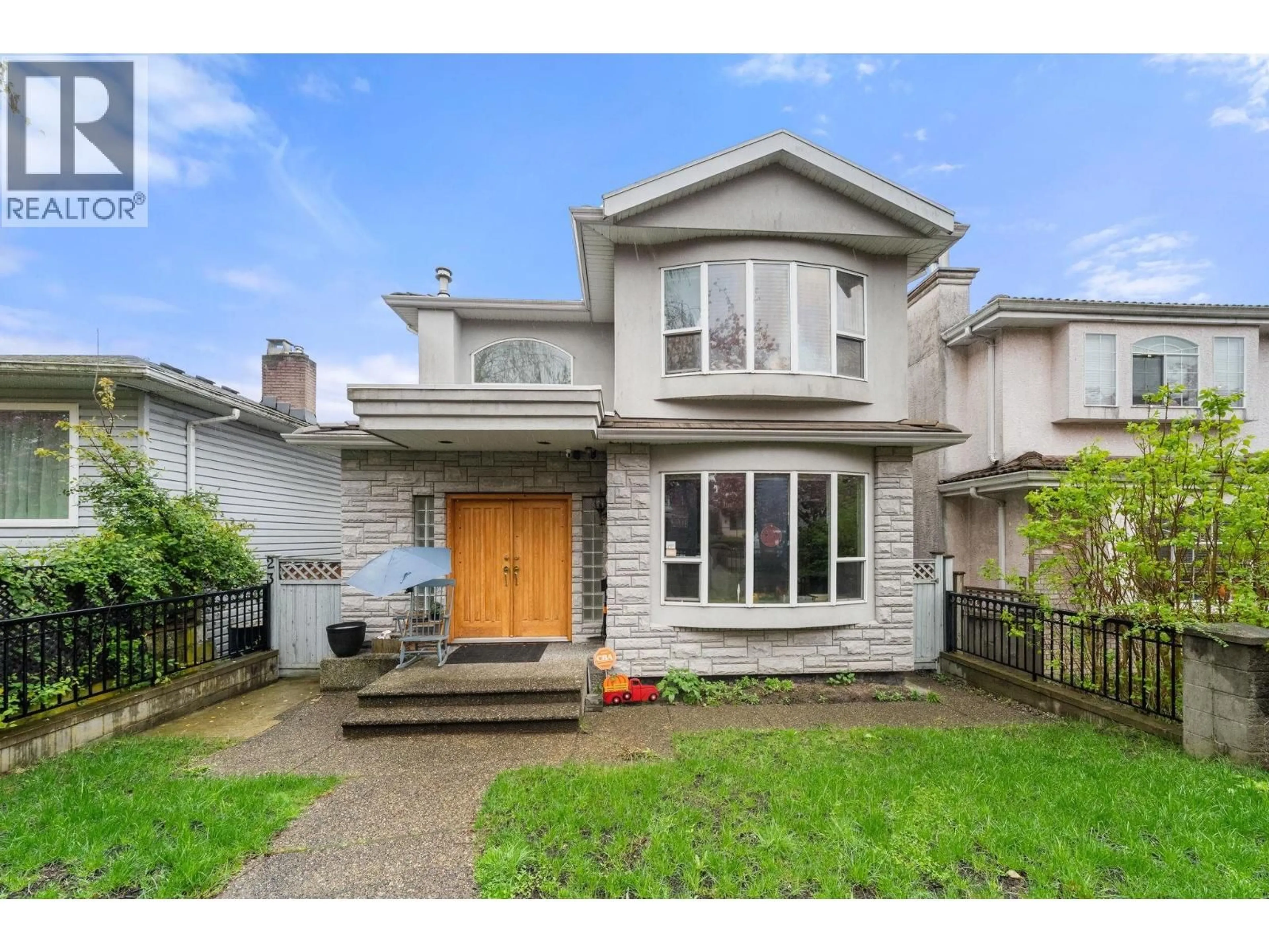 Home with vinyl exterior material, street for 62 61ST AVENUE, Vancouver British Columbia V5X2B4