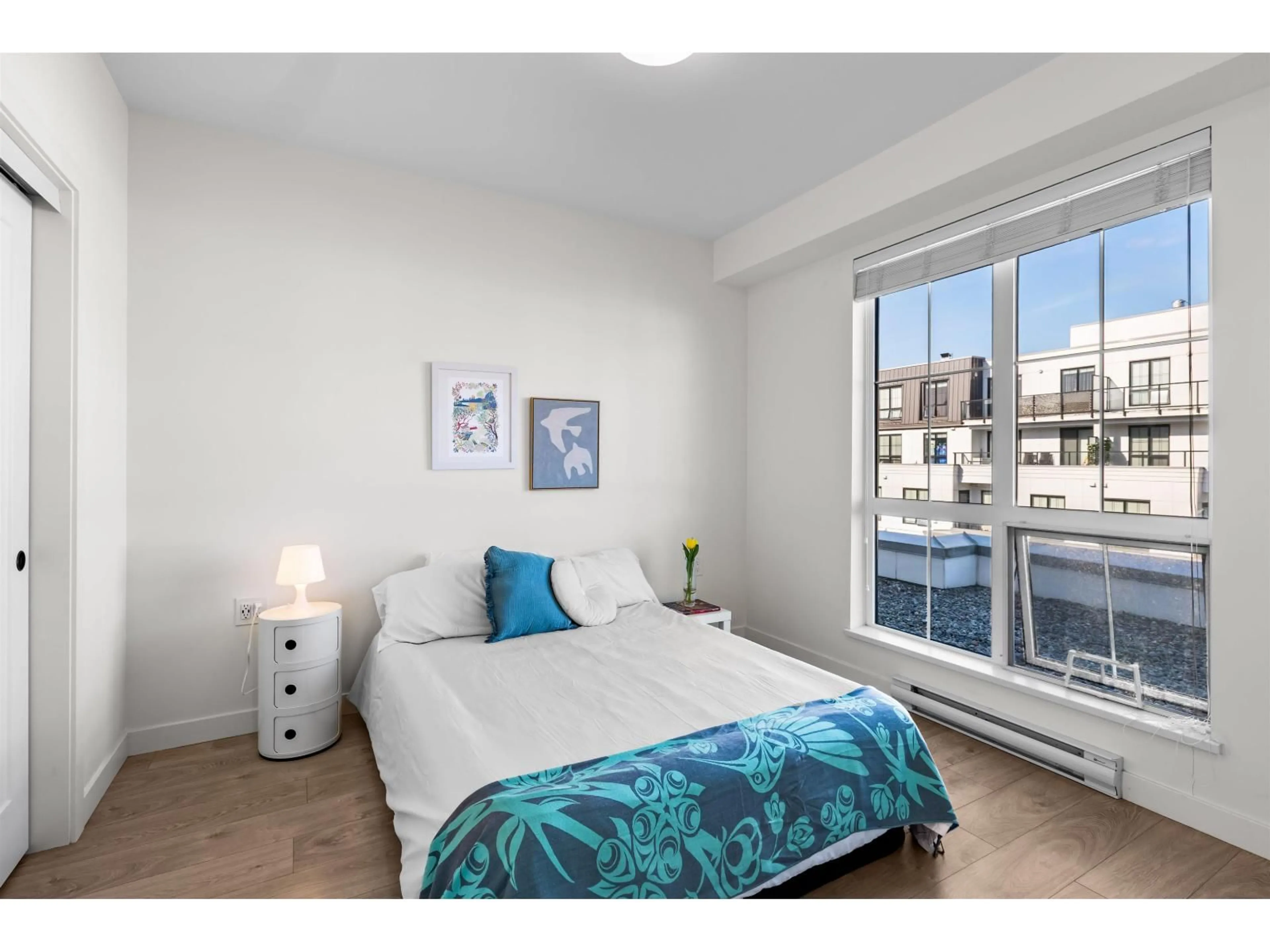 Bedroom with bed, wood/laminate floor for 501 - 20052 83A AVENUE, Langley British Columbia V2Y3P4