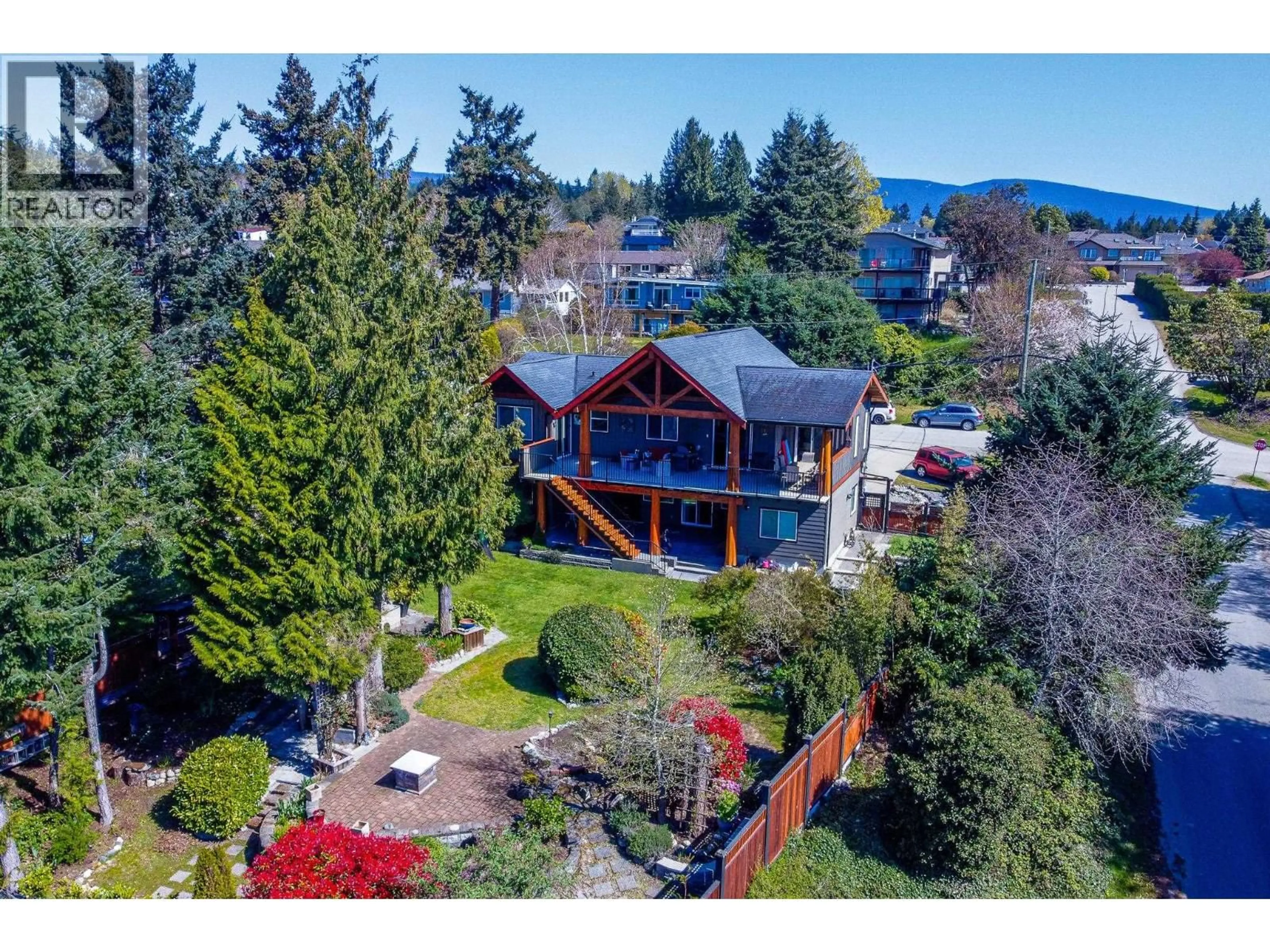 A pic from outside/outdoor area/front of a property/back of a property/a pic from drone, water/lake/river/ocean view for 4759 LAUREL AVENUE, Sechelt British Columbia V7Z0B4