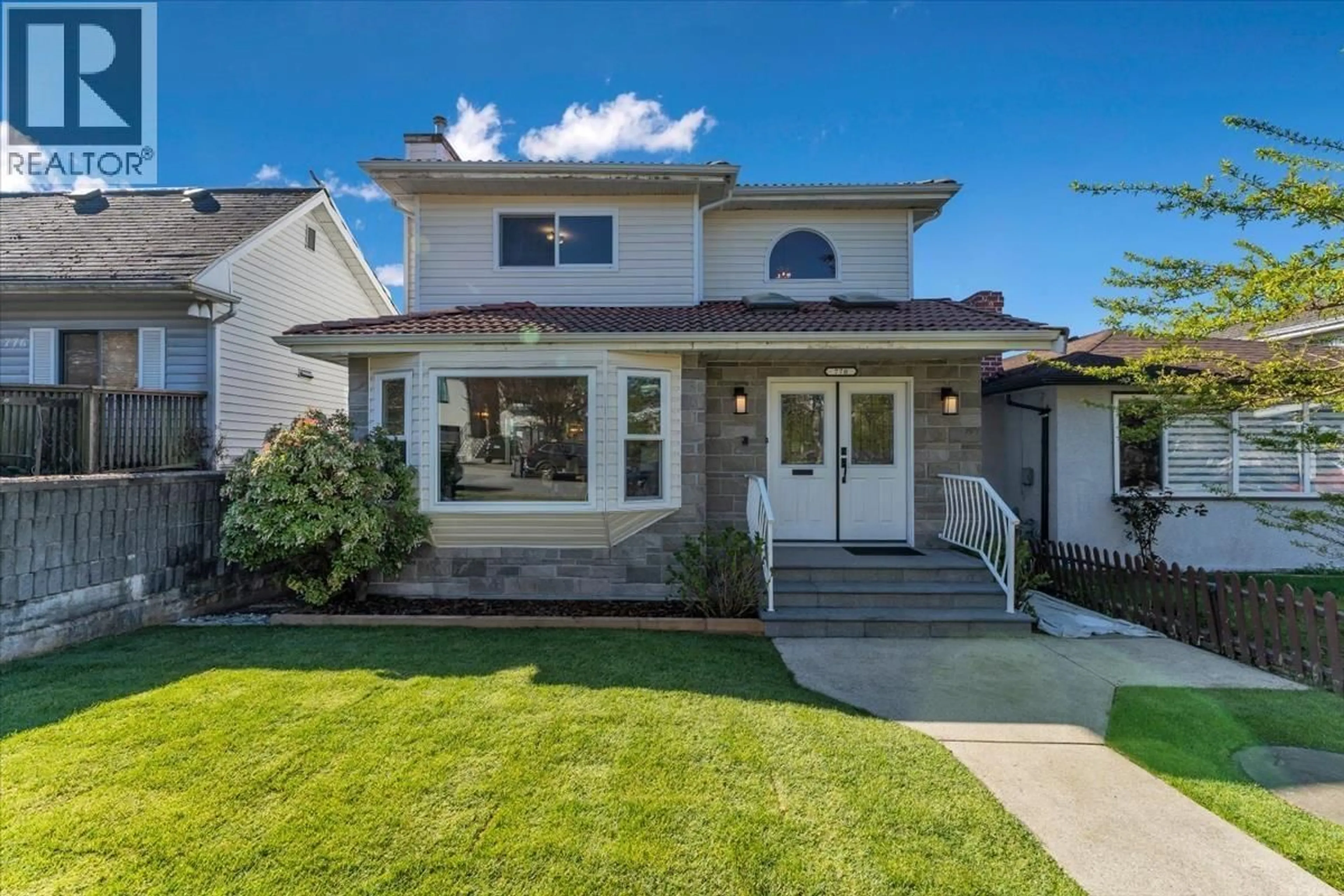 Home with vinyl exterior material, street for 770 61ST AVENUE, Vancouver British Columbia V5X2C2