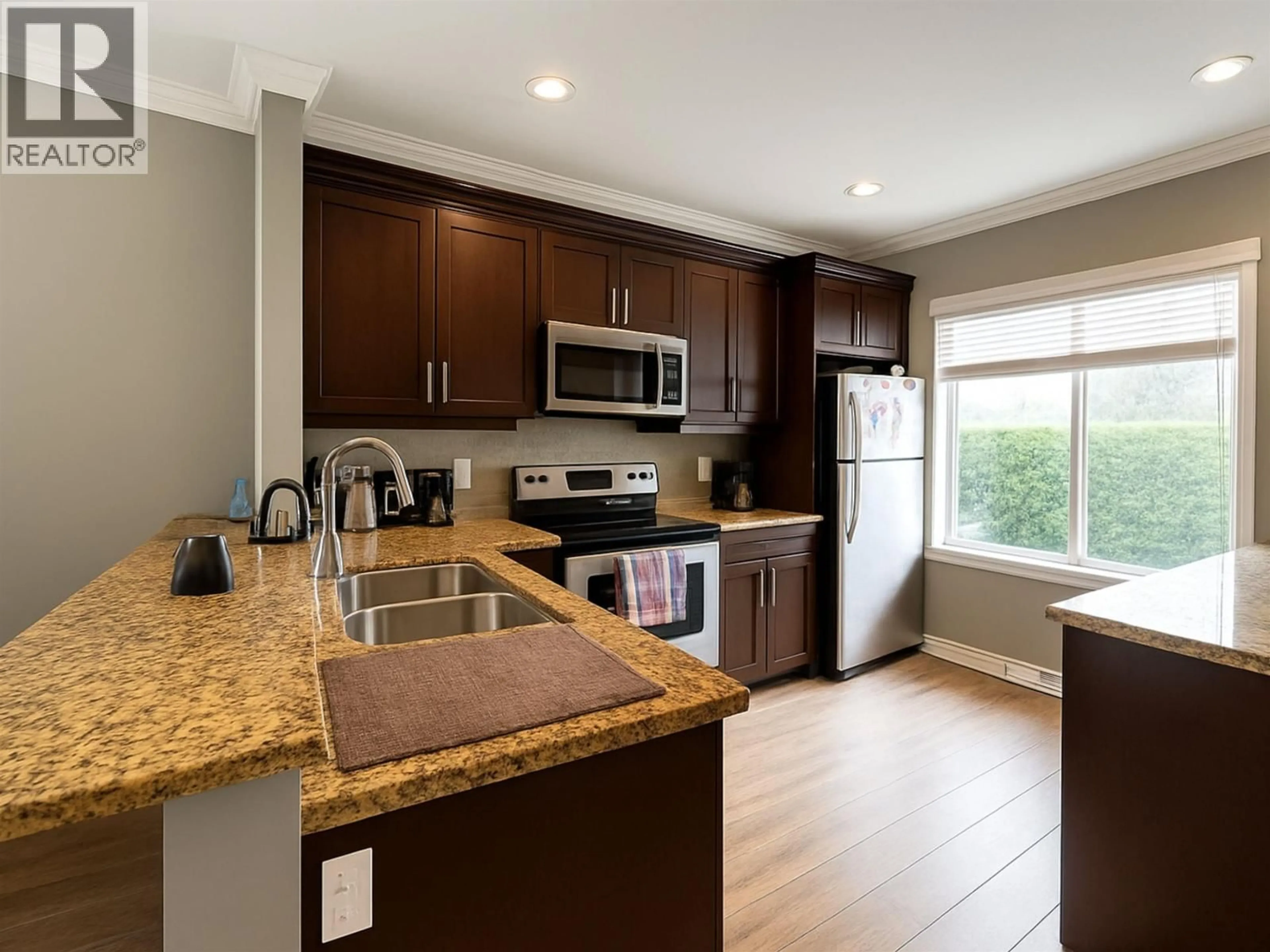 Open concept kitchen, unknown for 11 - 22386 SHARPE AVENUE, Richmond British Columbia V6V0A1