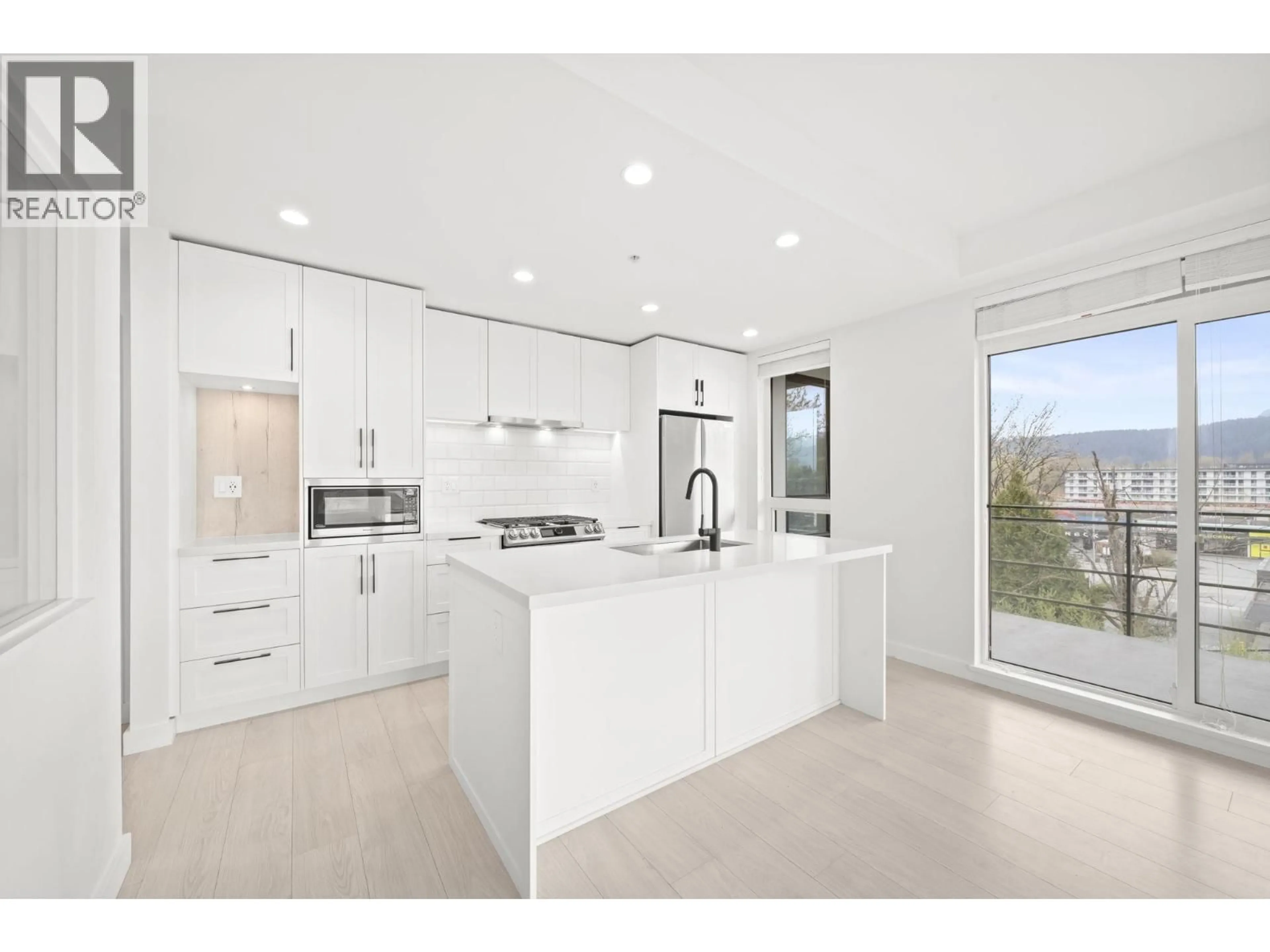 Open concept kitchen, ceramic/tile floor for 405 - 3038 ST GEORGE STREET, Port Moody British Columbia V3H0L3