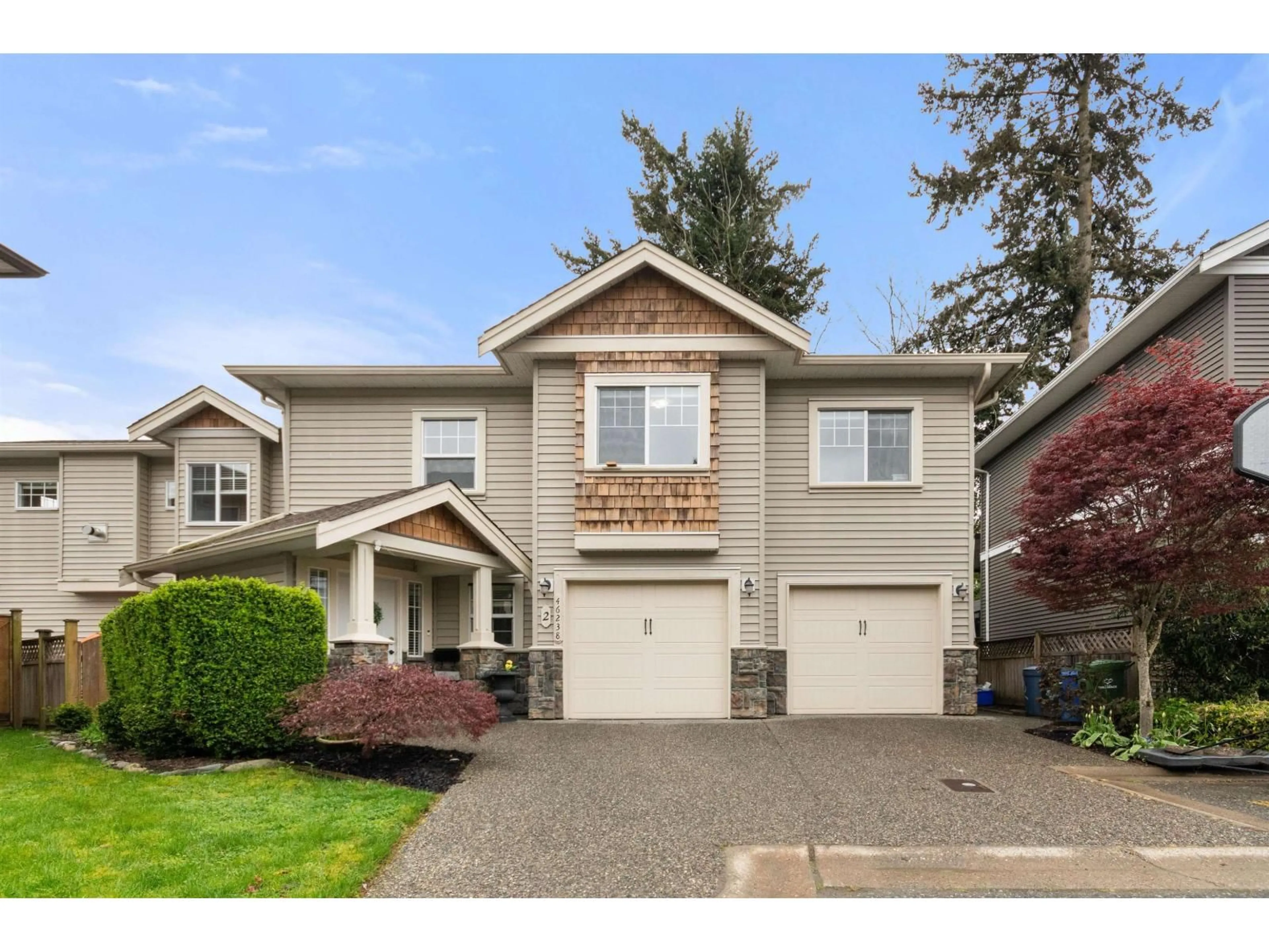 Home with vinyl exterior material, street for 2 - 46238 STRATHCONA ROAD, Chilliwack British Columbia V2P3T2