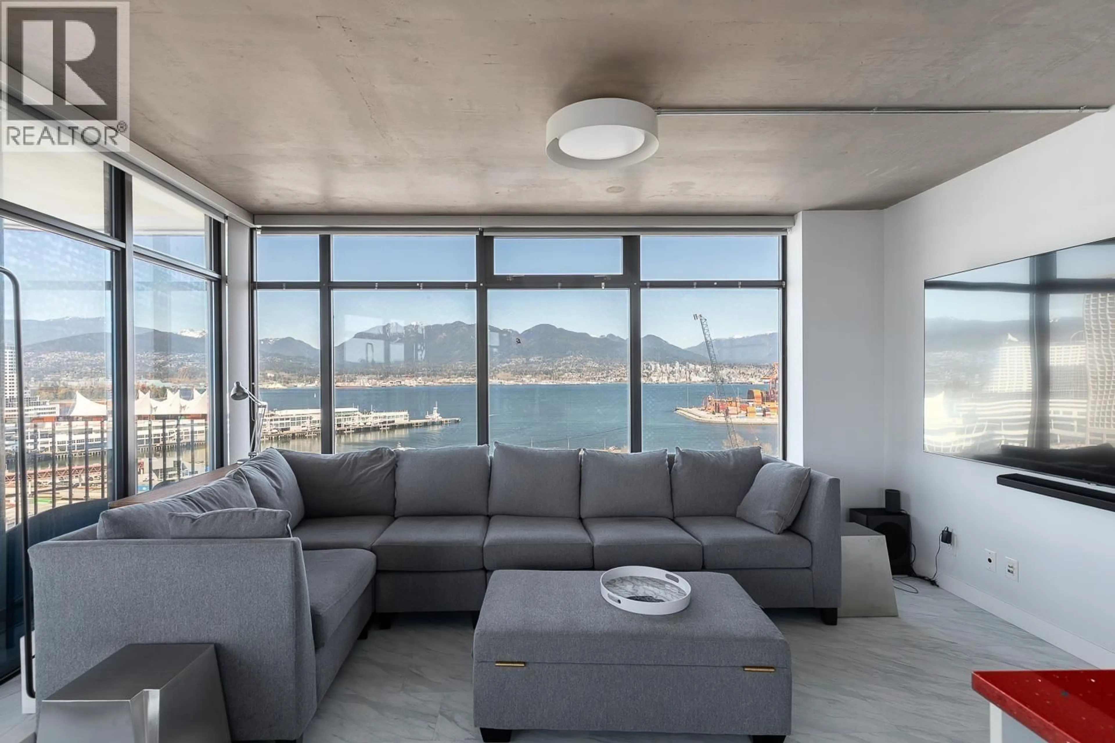 Living room with furniture, cement floor for 2410 - 128 CORDOVA STREET, Vancouver British Columbia V6B0E6