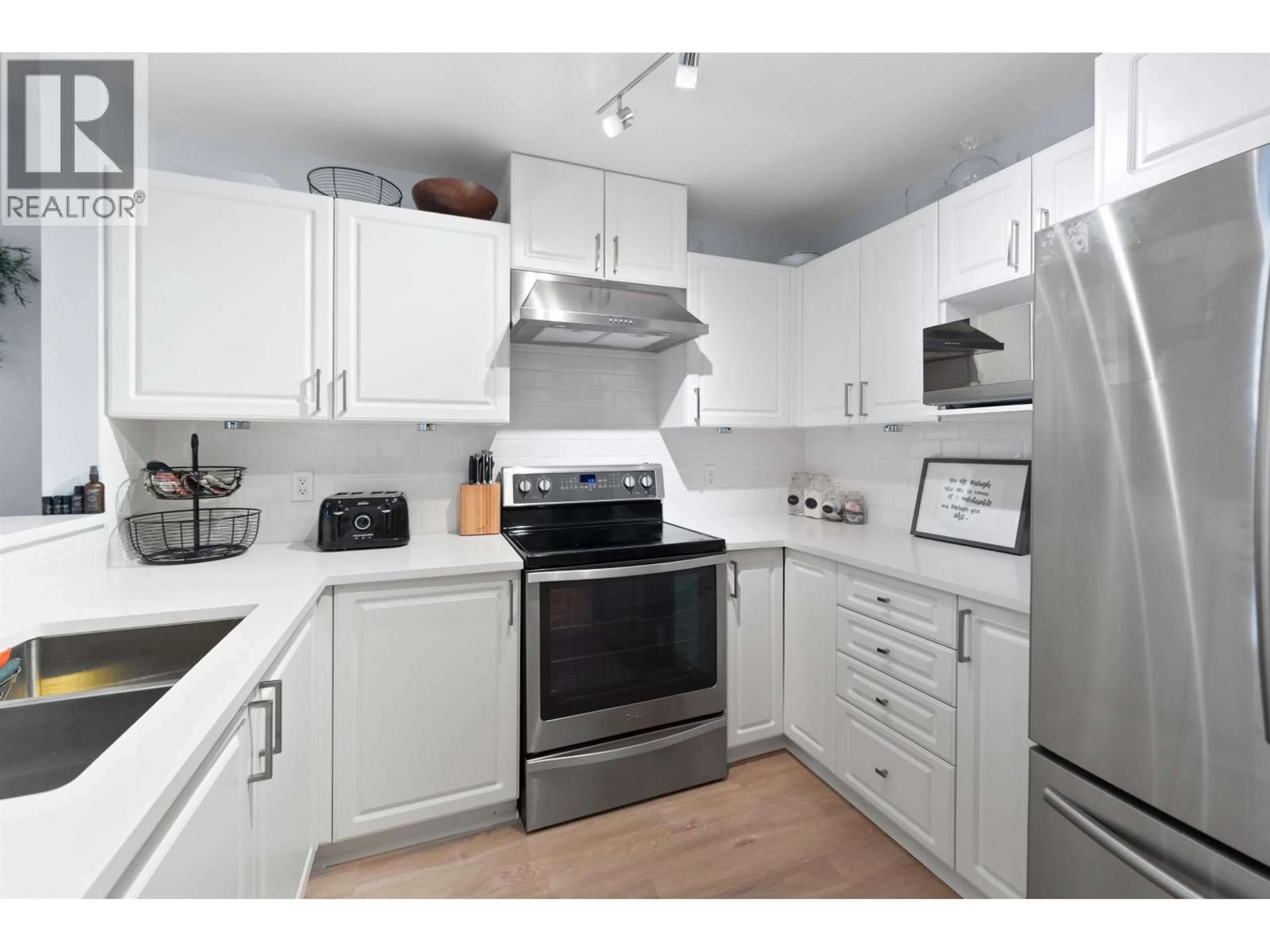 Standard kitchen, wood/laminate floor for 304 - 137 17TH STREET, North Vancouver British Columbia V7M1V5