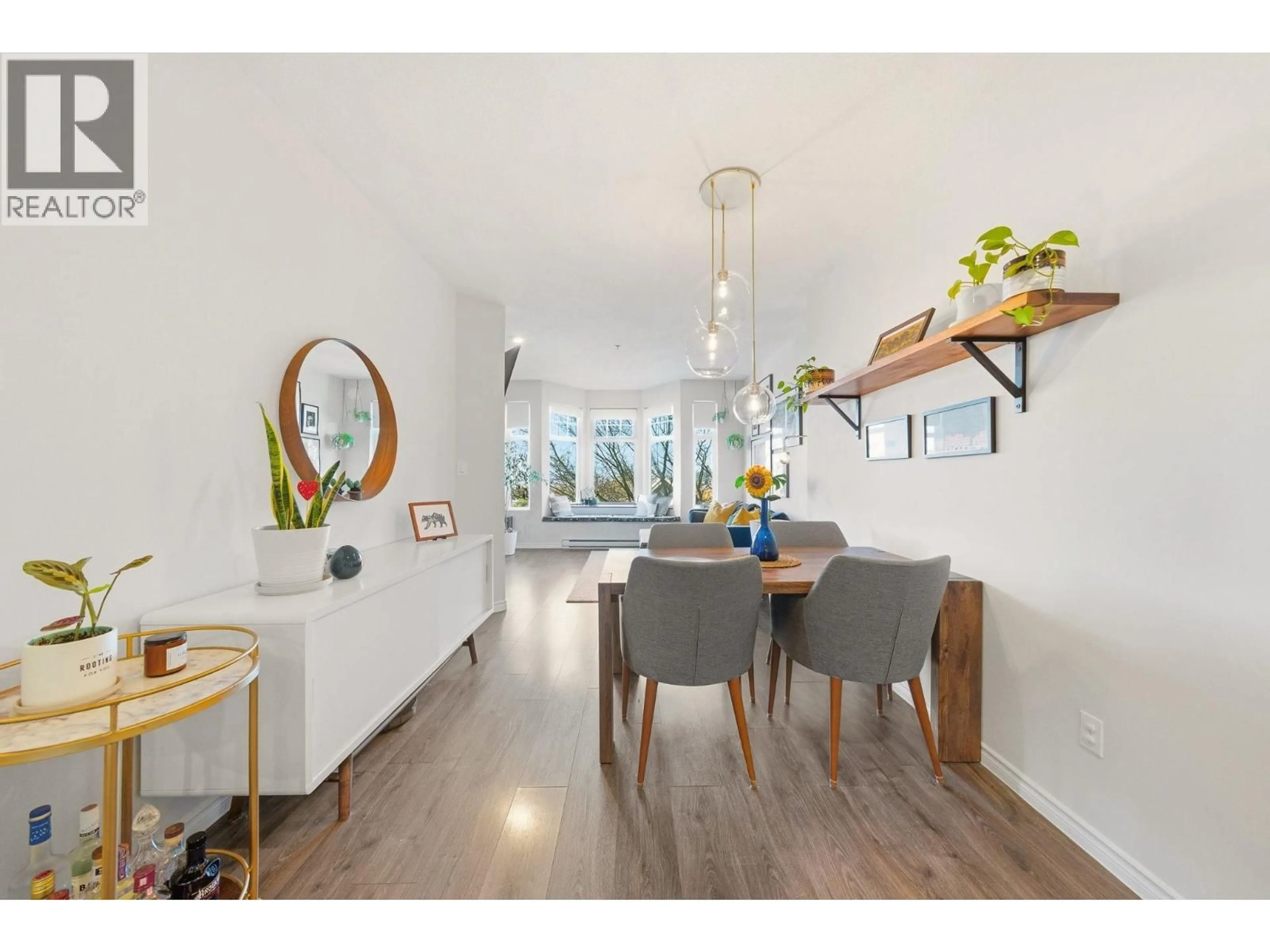 Dining room, wood/laminate floor for 209 - 580 TWELFTH STREET, New Westminster British Columbia V3M4H9