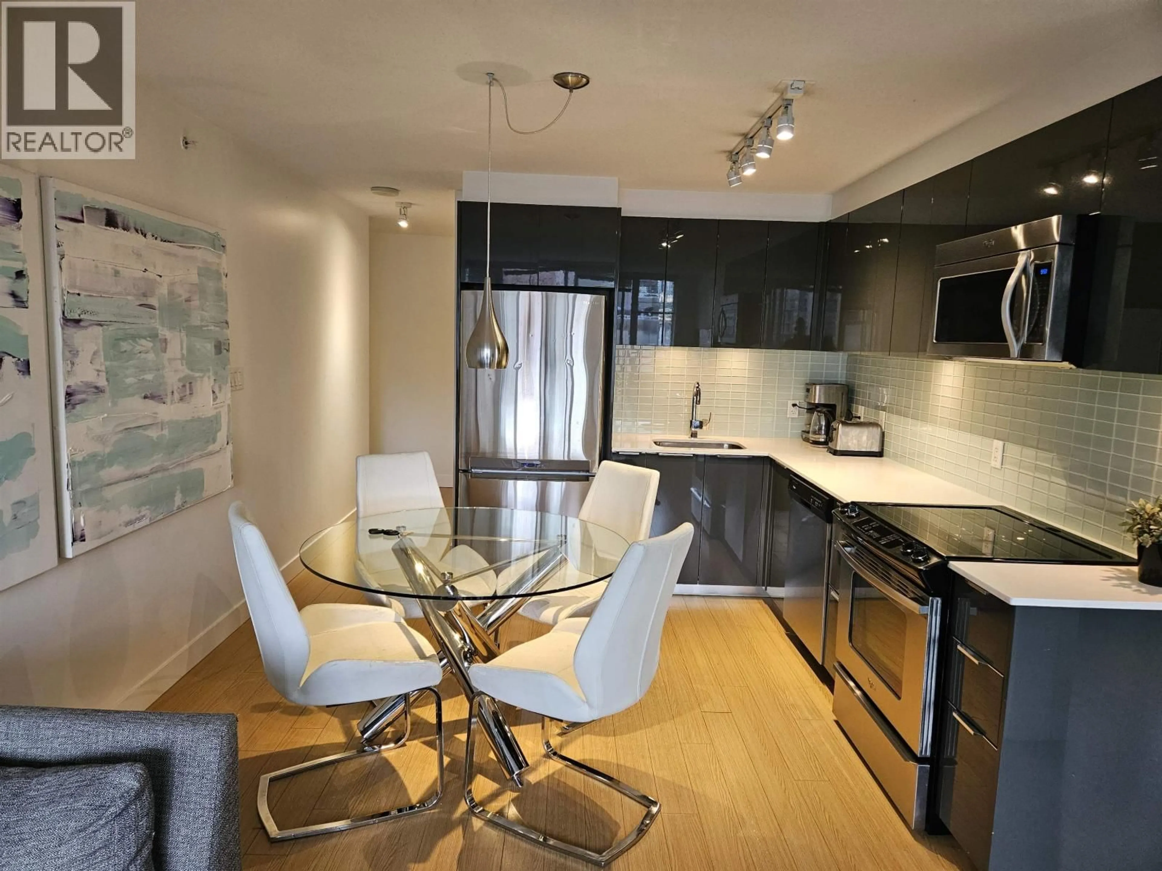 Open concept kitchen, unknown for 702 - 1325 ROLSTON STREET, Vancouver British Columbia V6B0M2