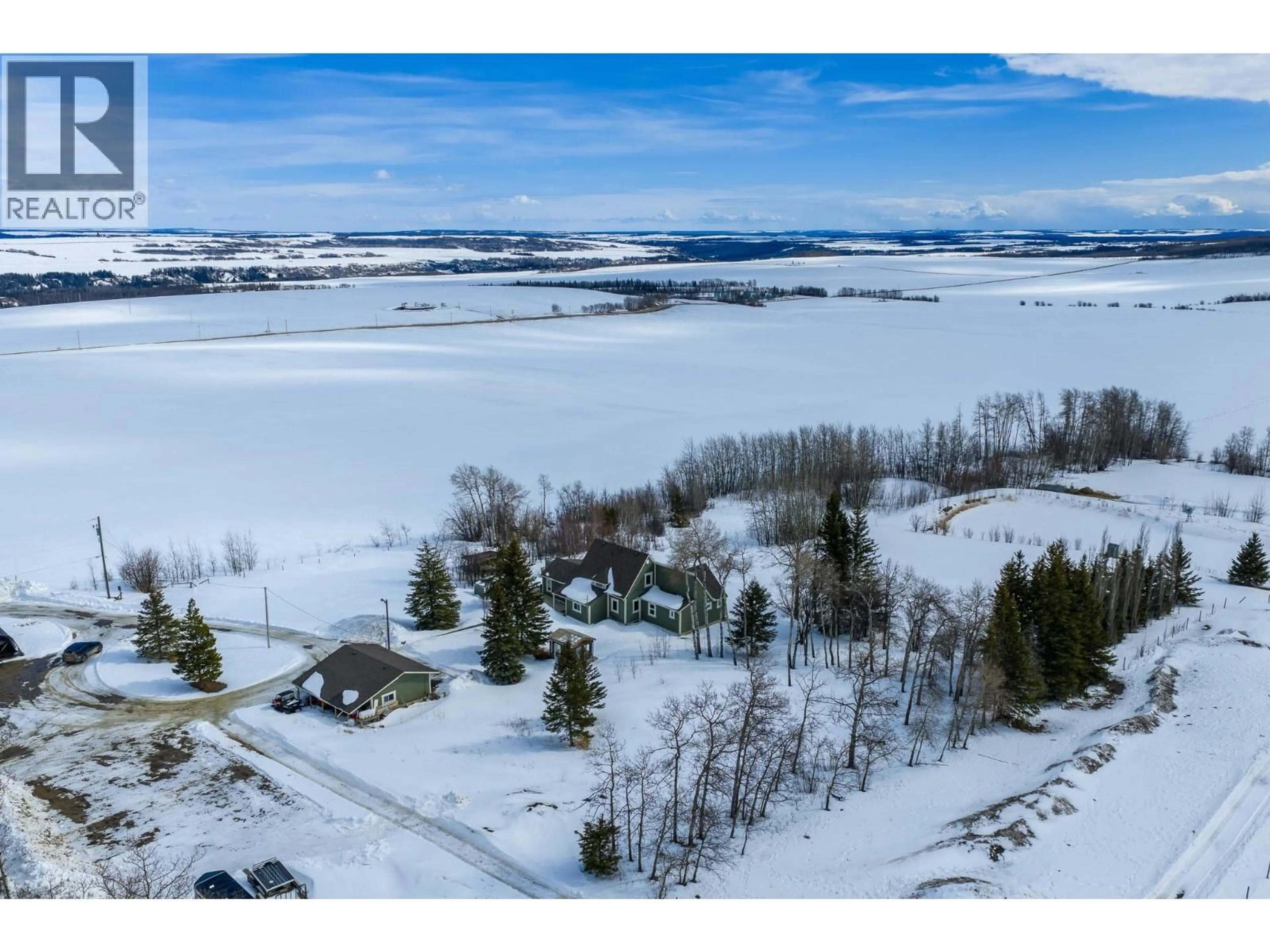 A pic from outside/outdoor area/front of a property/back of a property/a pic from drone, water/lake/river/ocean view for 14147 SMITH ROAD, Fort St. John British Columbia V1J4M6