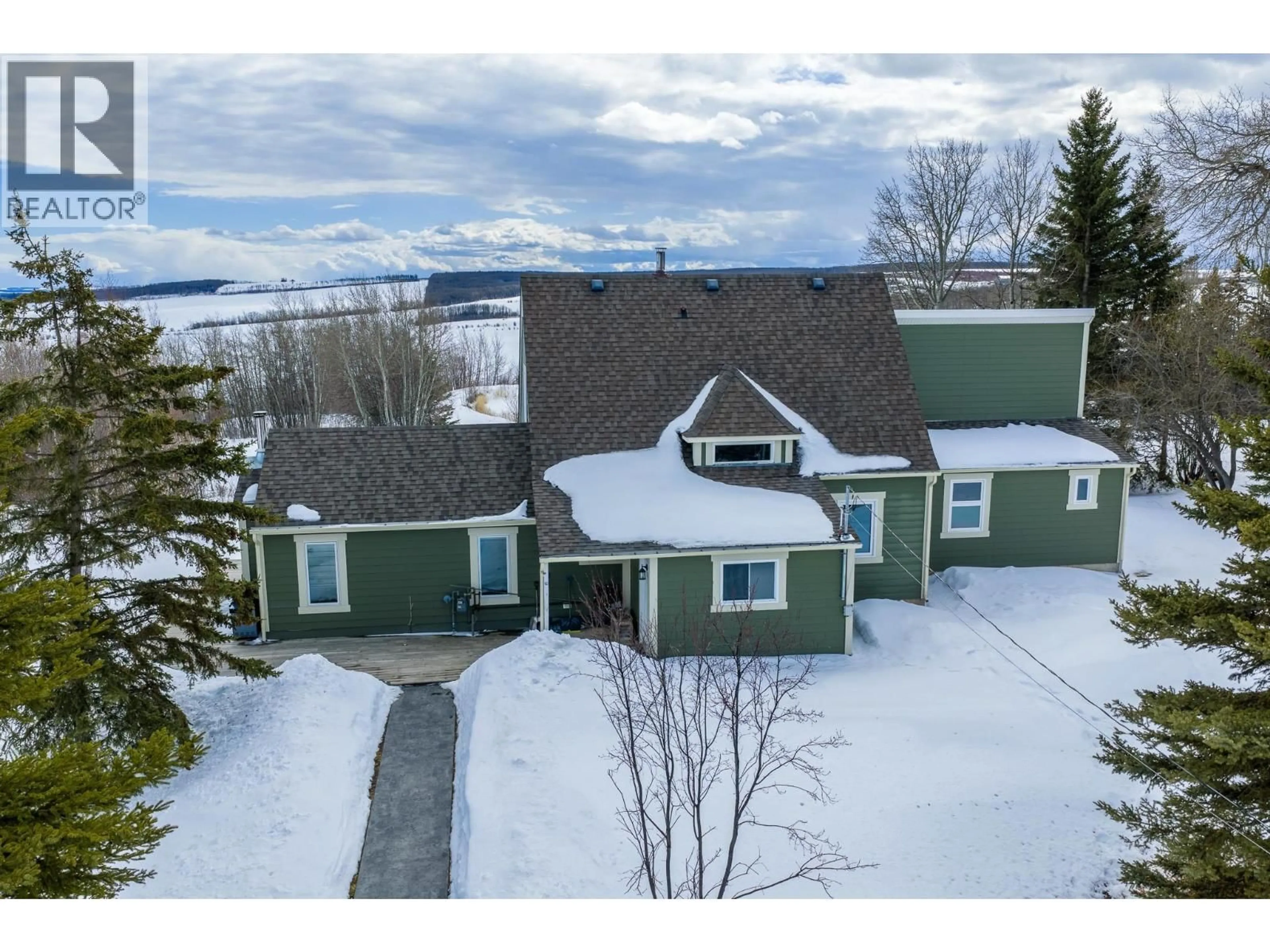 A pic from outside/outdoor area/front of a property/back of a property/a pic from drone, mountain view for 14147 SMITH ROAD, Fort St. John British Columbia V1J4M6