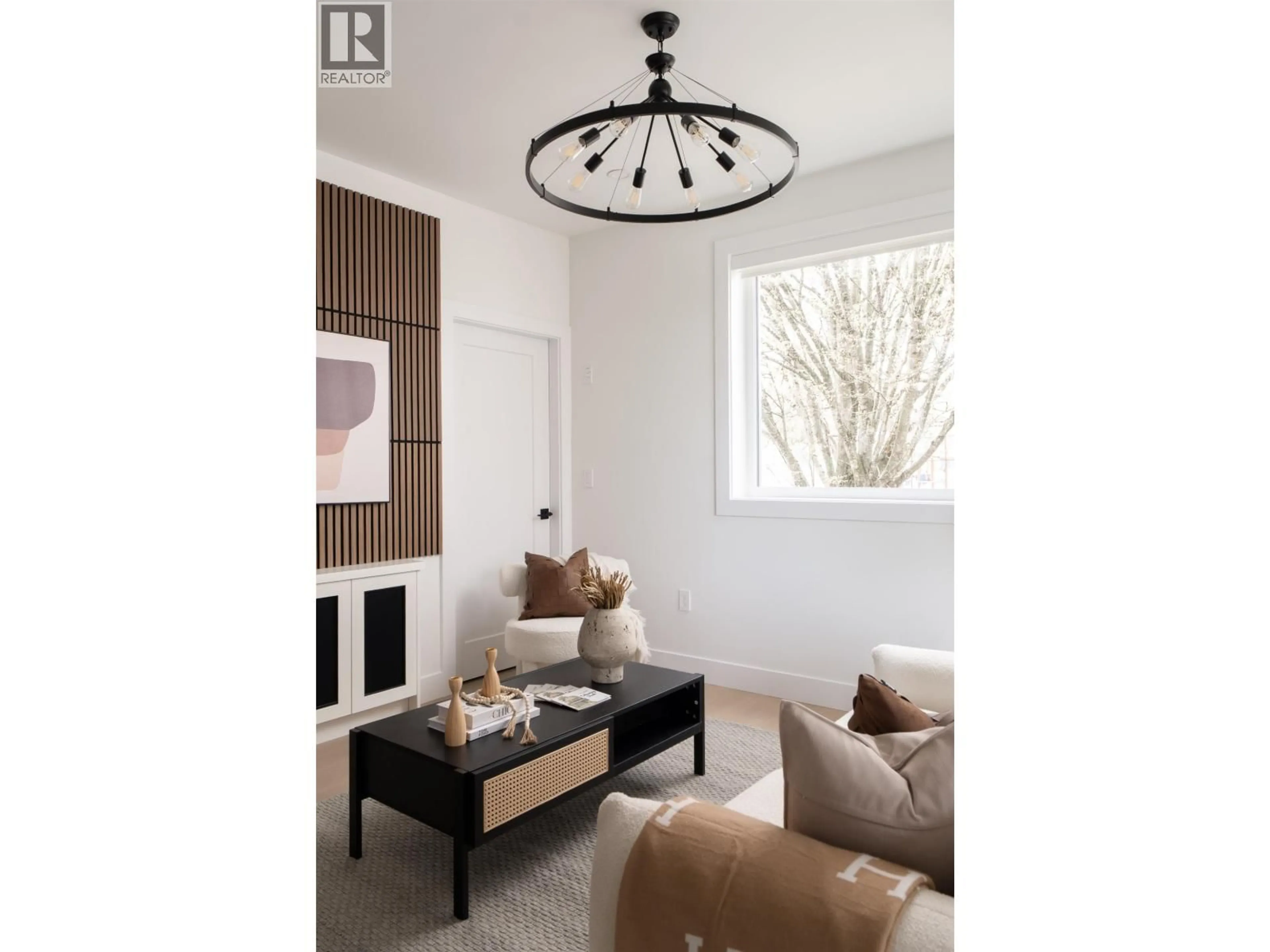 Living room with furniture, wood/laminate floor for 2612 HORLEY STREET, Vancouver British Columbia V5R3L6