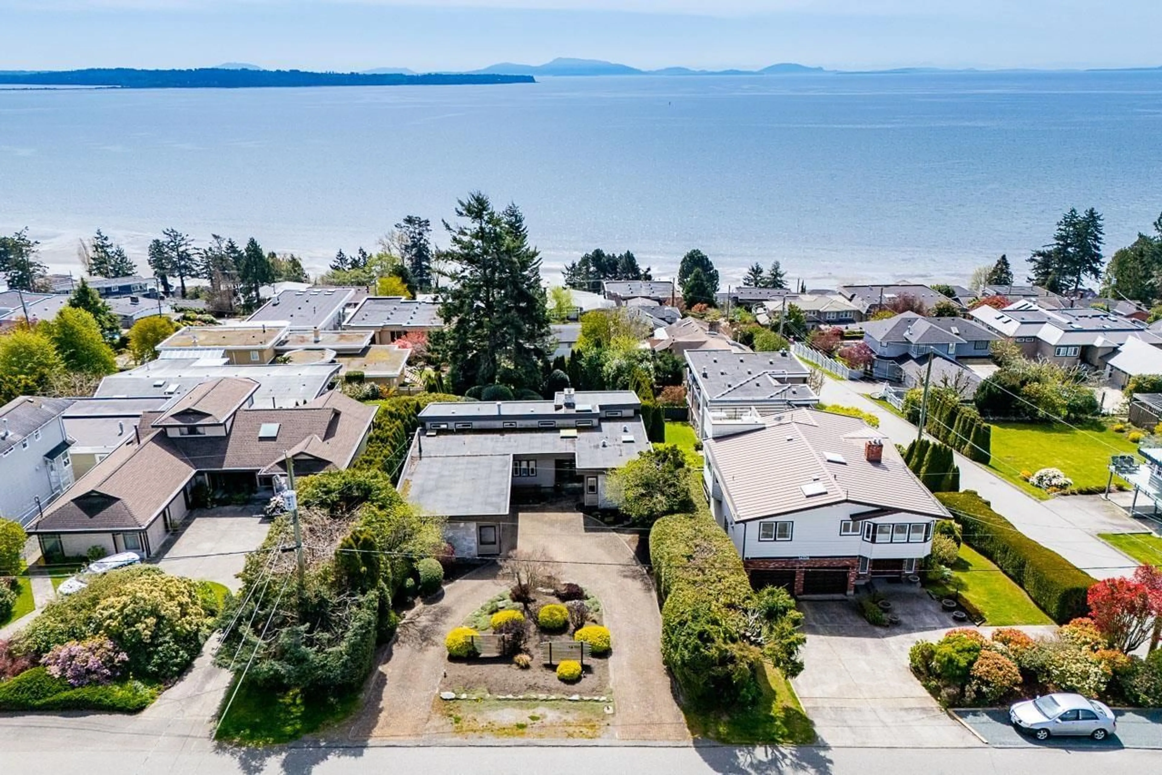 A pic from outside/outdoor area/front of a property/back of a property/a pic from drone, water/lake/river/ocean view for 14366 MAGDALEN AVENUE, White Rock British Columbia V4B2X3