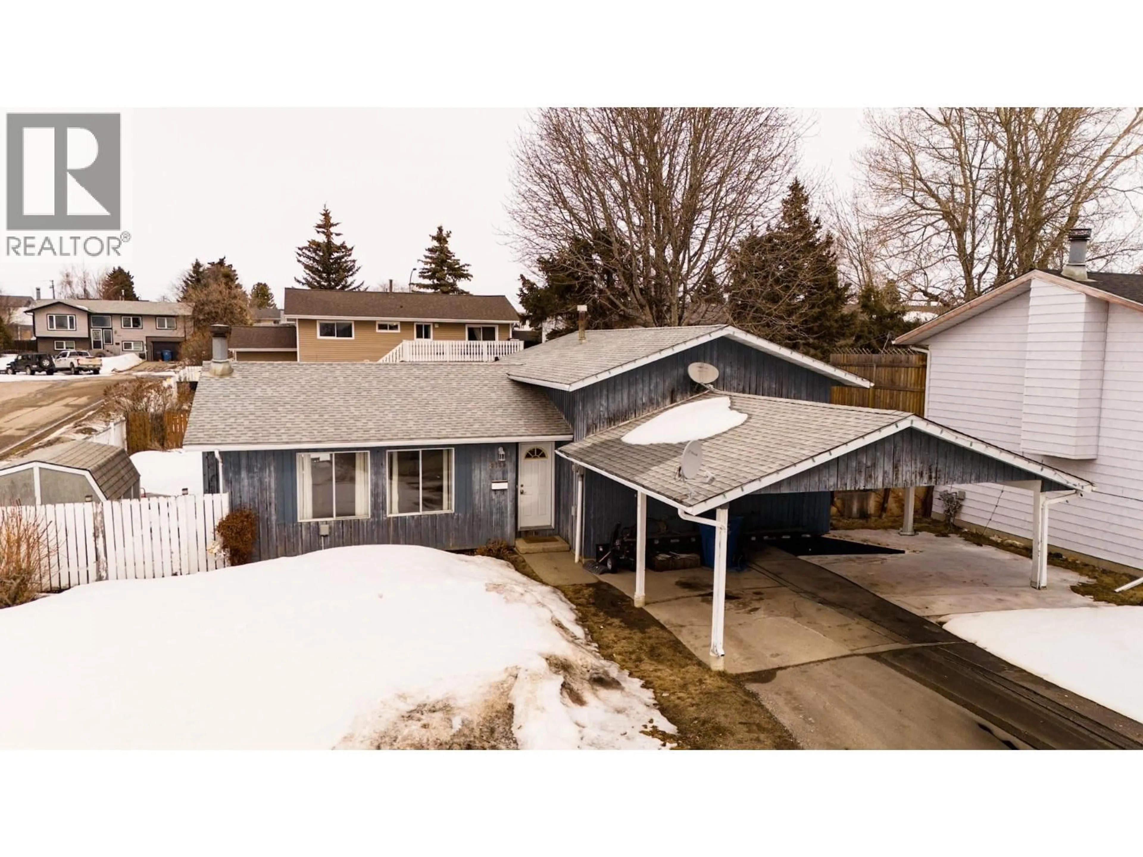 A pic from outside/outdoor area/front of a property/back of a property/a pic from drone, street for 9128 97 AVENUE, Fort St. John British Columbia V1J5E3