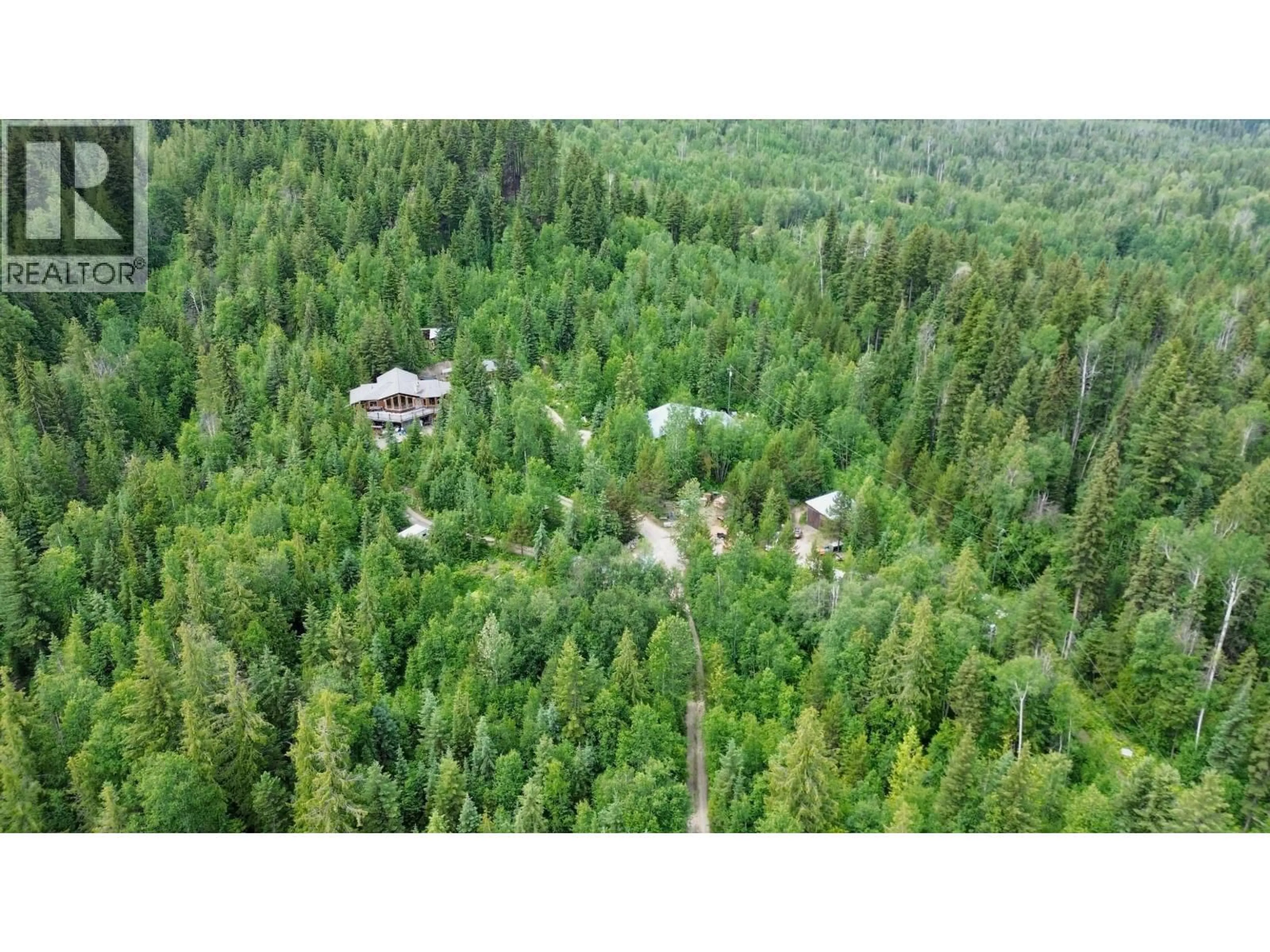 A pic from outside/outdoor area/front of a property/back of a property/a pic from drone, forest/trees view for 3561 CANIM-HENDRIX LAKE ROAD, Canim Lake British Columbia V0K1L0