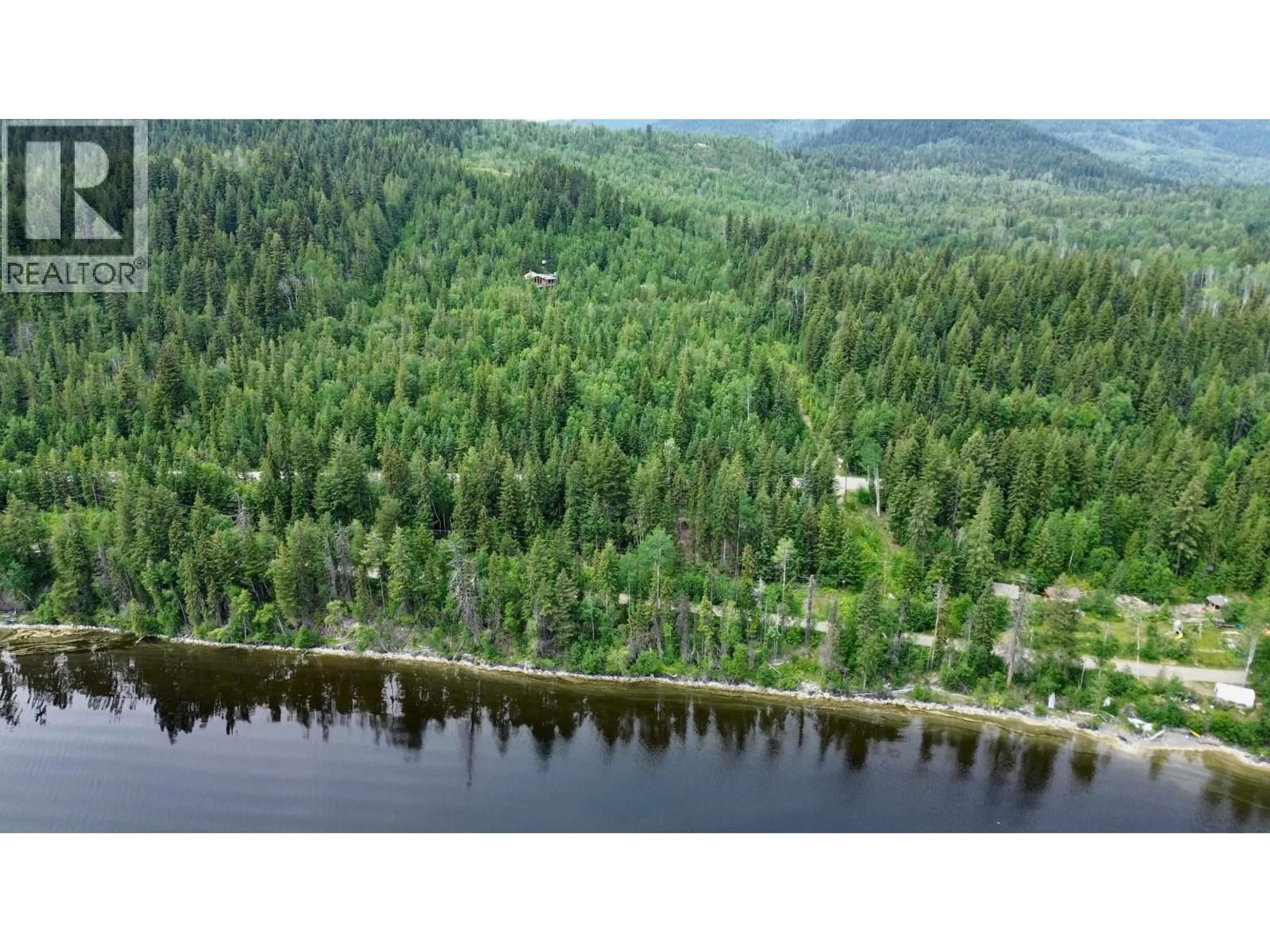 A pic from outside/outdoor area/front of a property/back of a property/a pic from drone, water/lake/river/ocean view for 3561 CANIM-HENDRIX LAKE ROAD, Canim Lake British Columbia V0K1L0