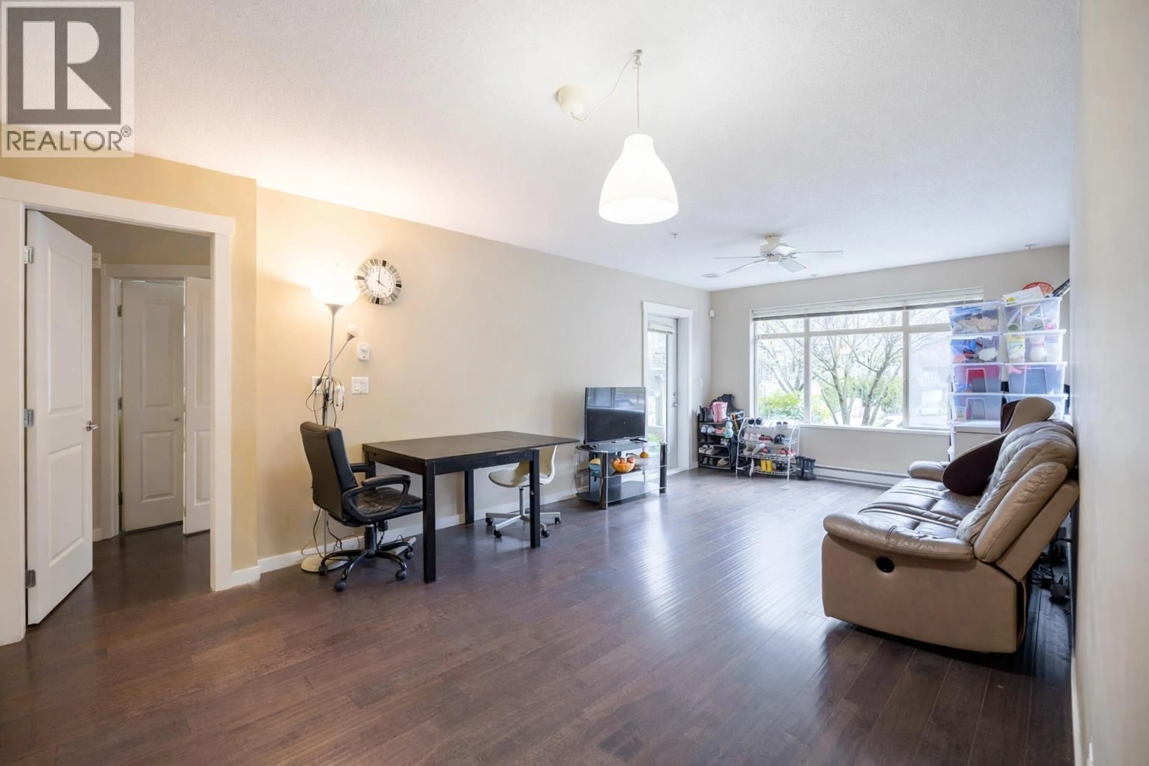 Living room with furniture, wood/laminate floor for 129 - 9288 ODLIN ROAD, Richmond British Columbia V6X0C3
