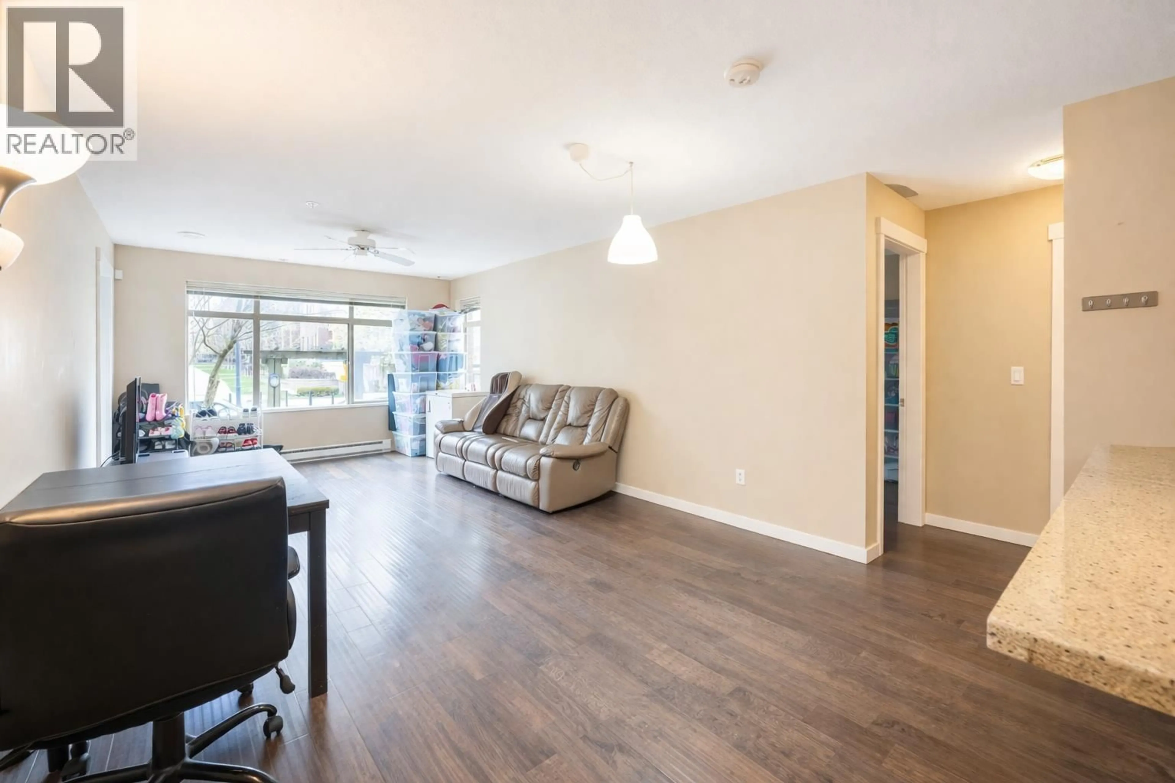 Living room with furniture, wood/laminate floor for 129 - 9288 ODLIN ROAD, Richmond British Columbia V6X0C3