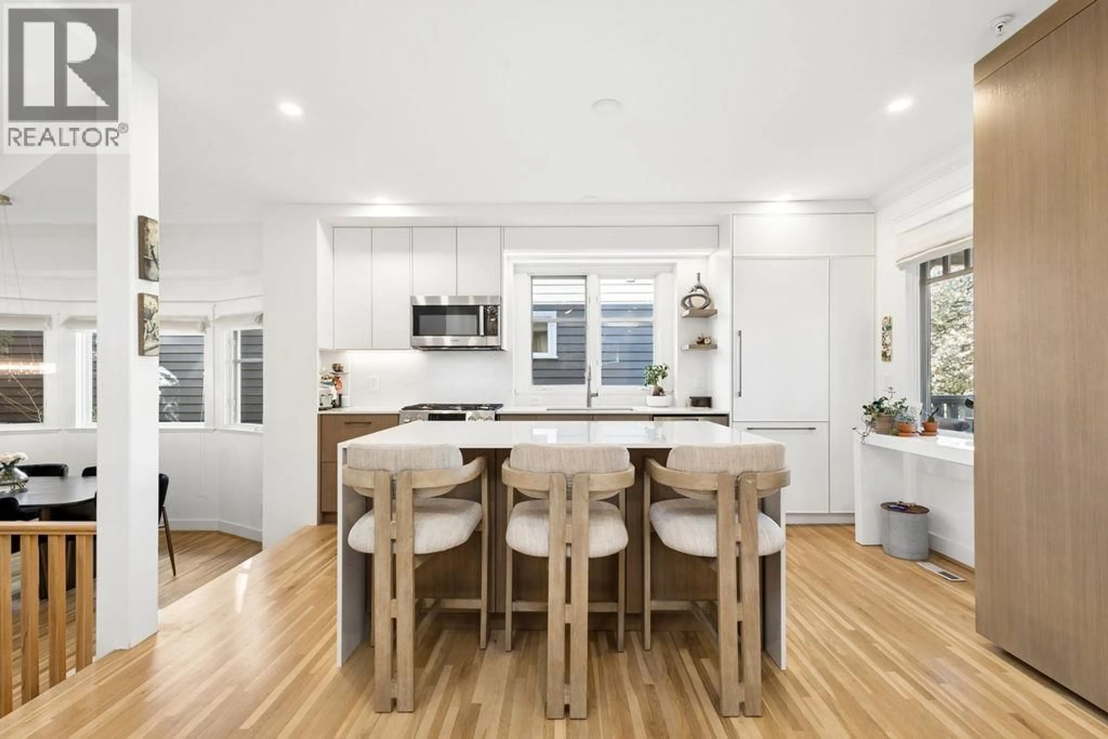 Open concept kitchen, wood/laminate floor for 1956 14 AVENUE, Vancouver British Columbia V6J2K2