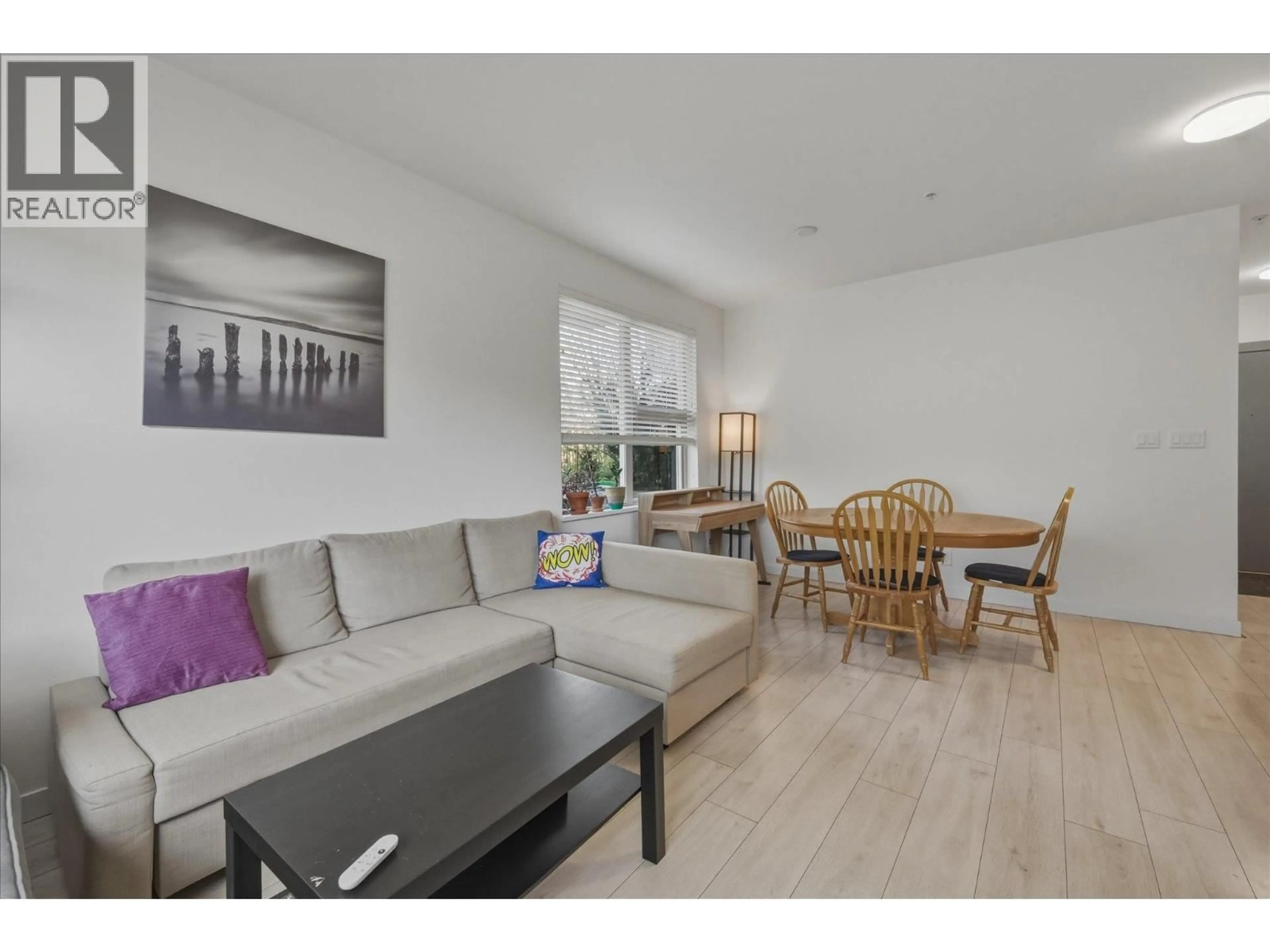 Living room with furniture, wood/laminate floor for 206 - 1150 BAILEY STREET, Squamish British Columbia V8B0R4