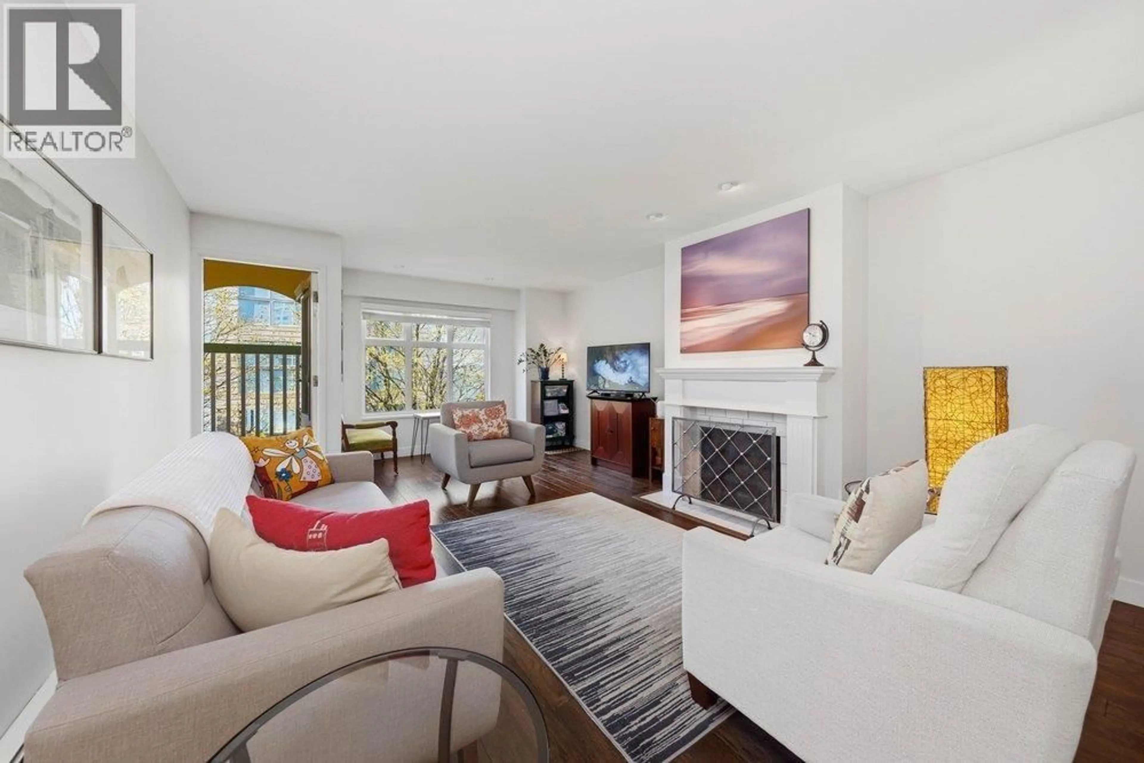 Living room with furniture, unknown for 411 - 1125 GILFORD STREET, Vancouver British Columbia V6G2P7