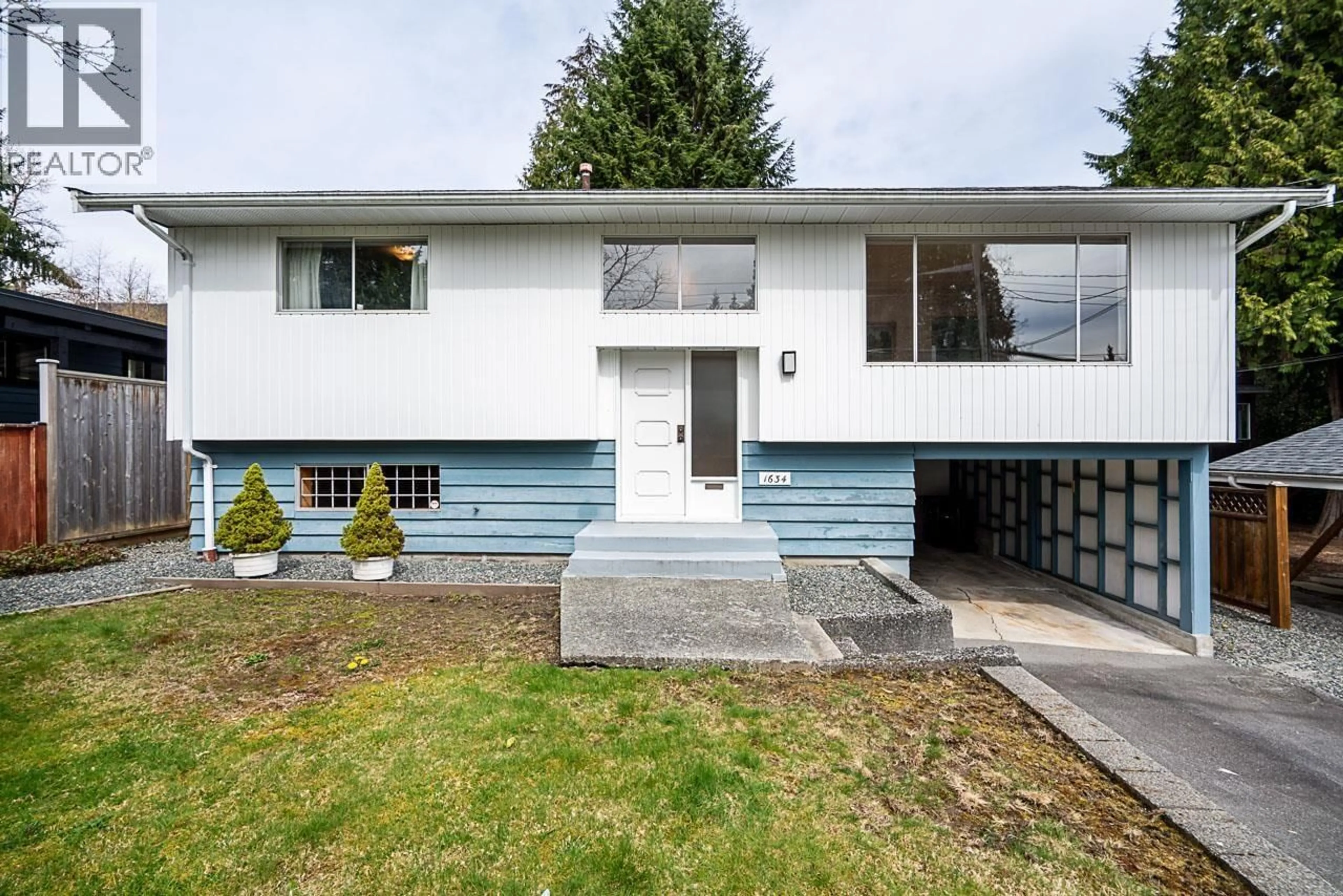 Home with vinyl exterior material, street for 1634 ROSS ROAD, North Vancouver British Columbia V7J1V4
