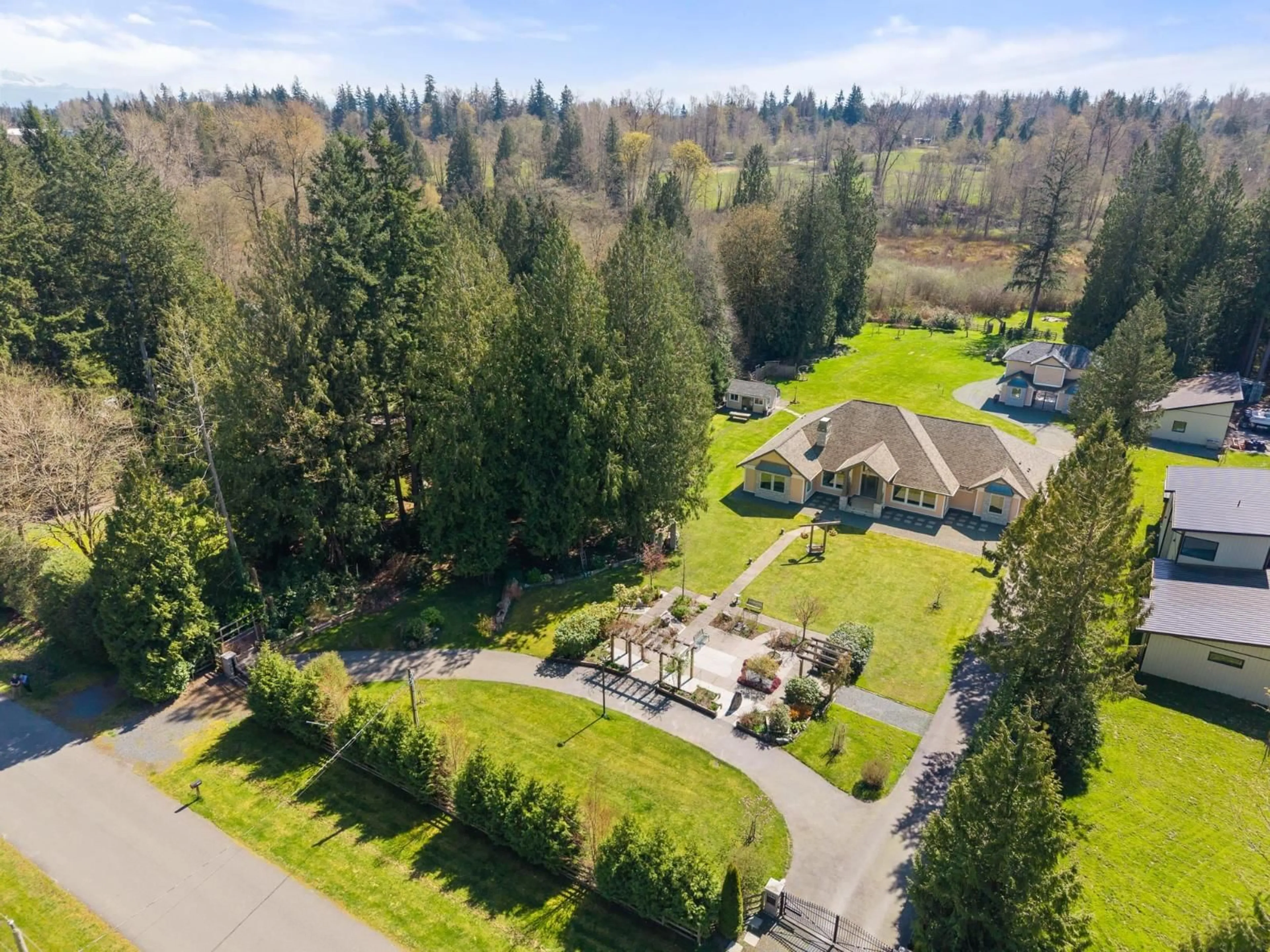 A pic from outside/outdoor area/front of a property/back of a property/a pic from drone, forest/trees view for 21842 6 AVENUE, Langley British Columbia V2Z1R6