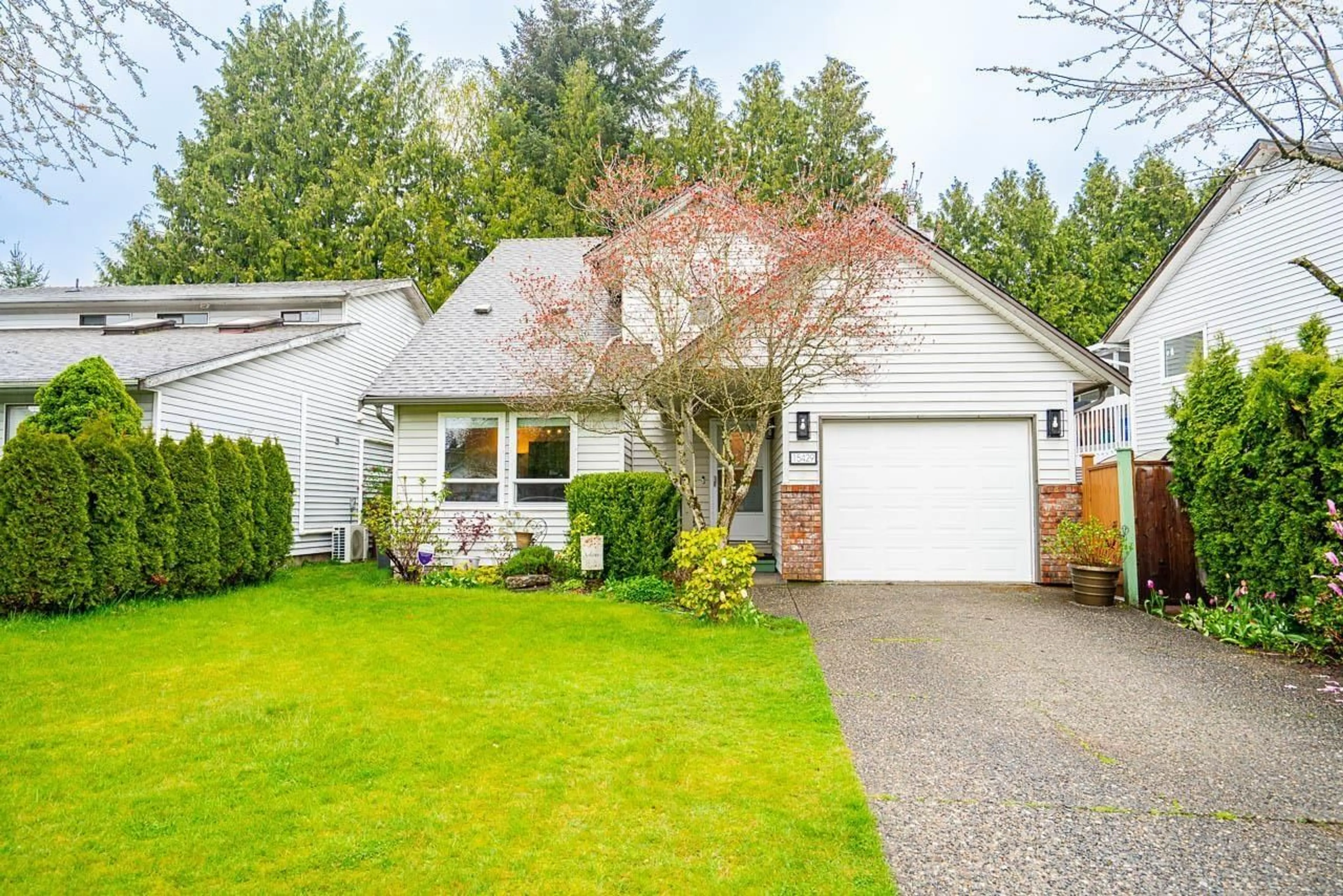 Home with vinyl exterior material, street for 15429 90 AVENUE, Surrey British Columbia V3R9J5