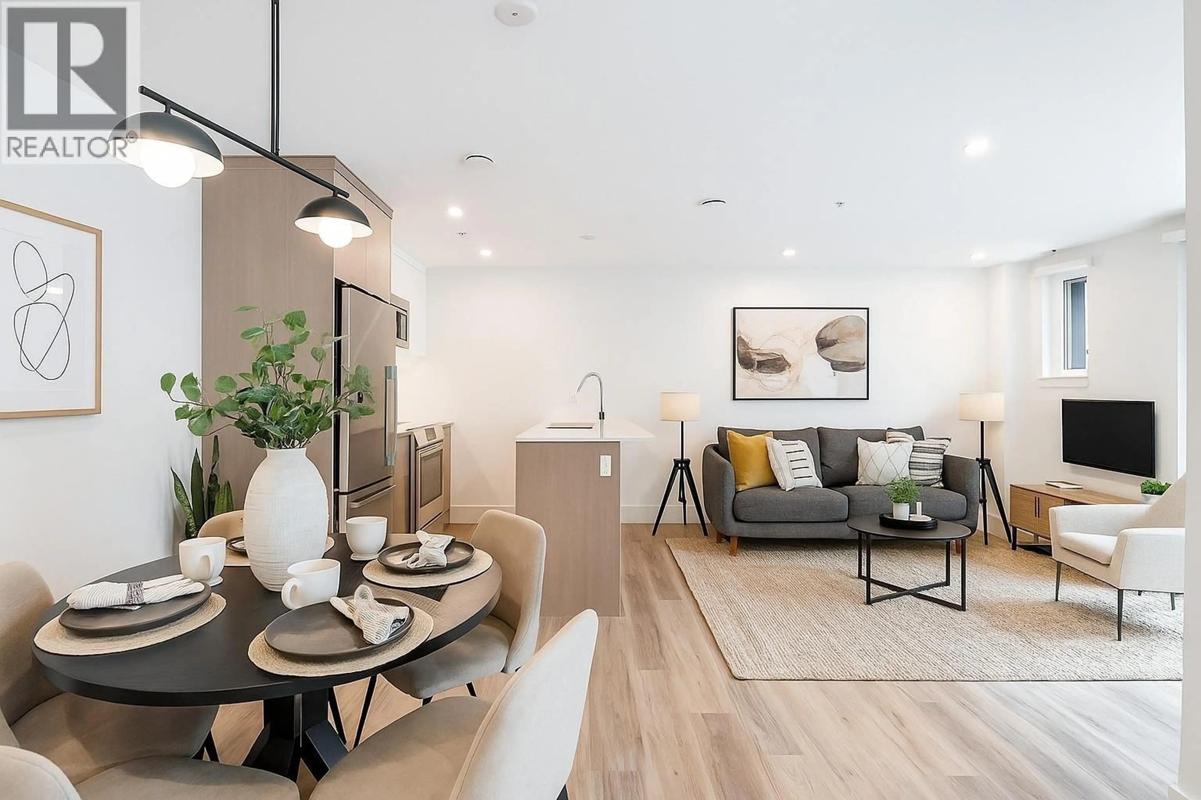 Living room with furniture, wood/laminate floor for 109 - 2085 1ST AVENUE, Vancouver British Columbia V5N1B6