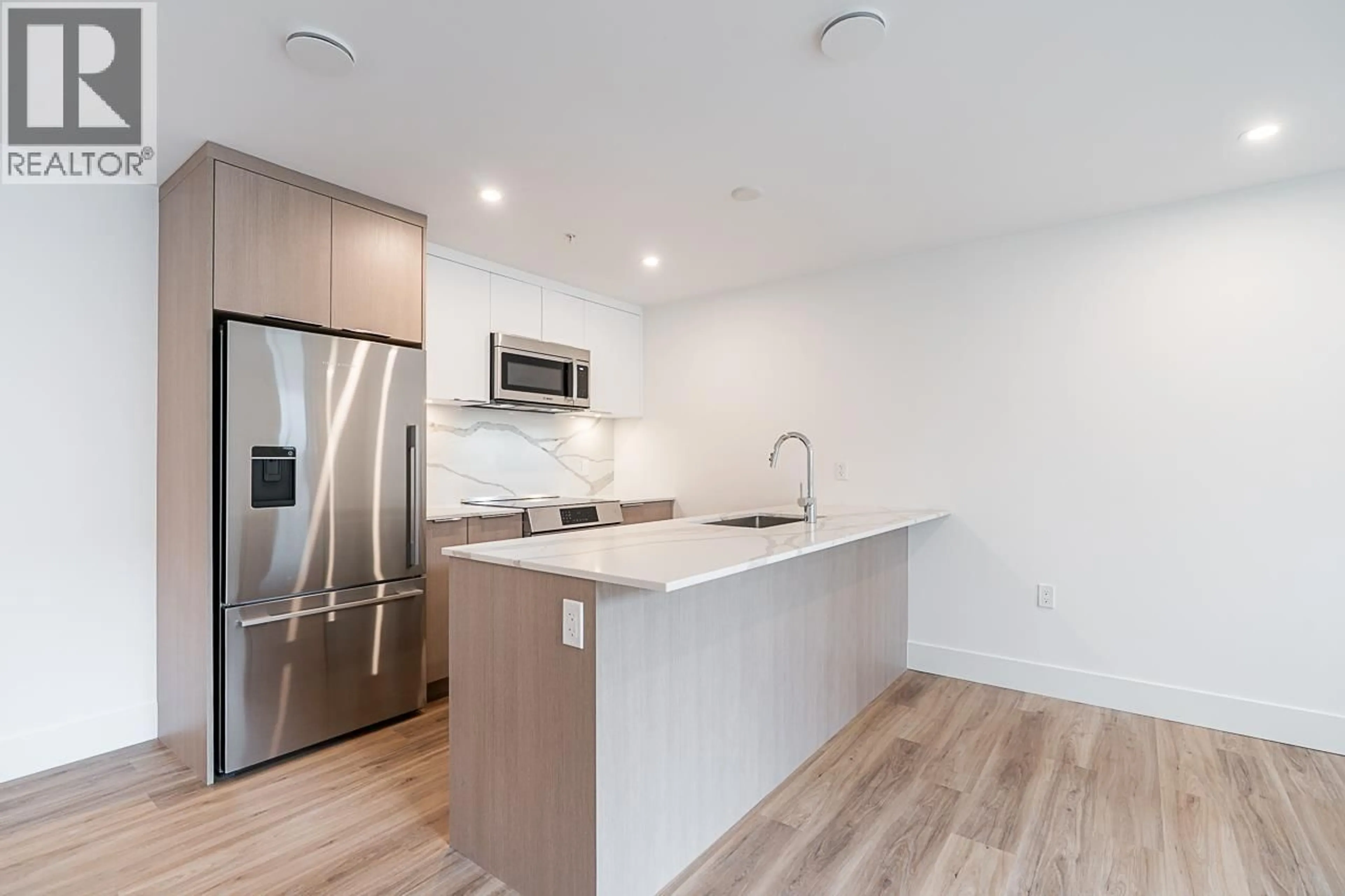 Open concept kitchen, unknown for 109 - 2085 1ST AVENUE, Vancouver British Columbia V5N1B6
