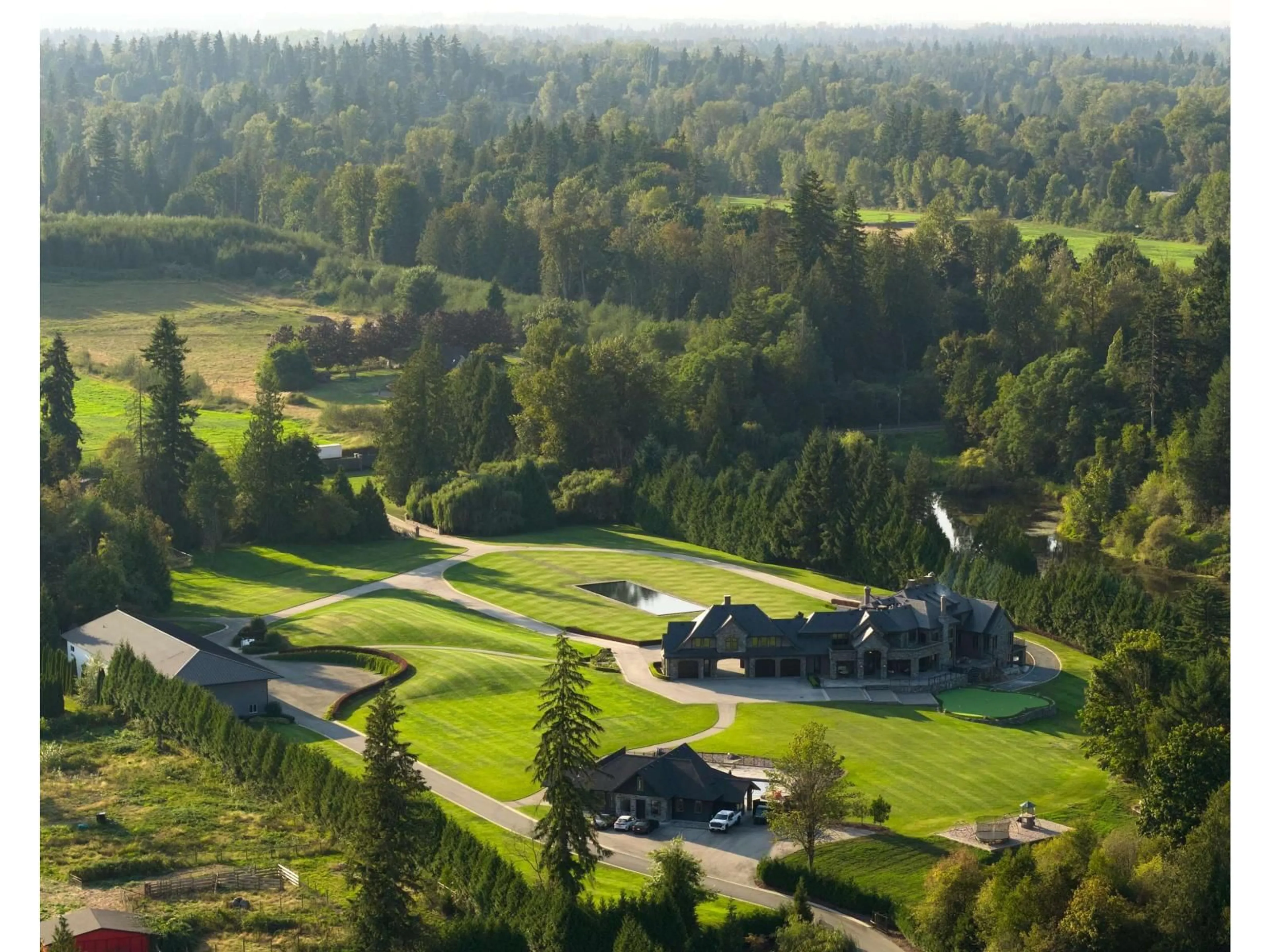 A pic from outside/outdoor area/front of a property/back of a property/a pic from drone, forest/trees view for 6124 272 STREET, Langley British Columbia V4W1S6