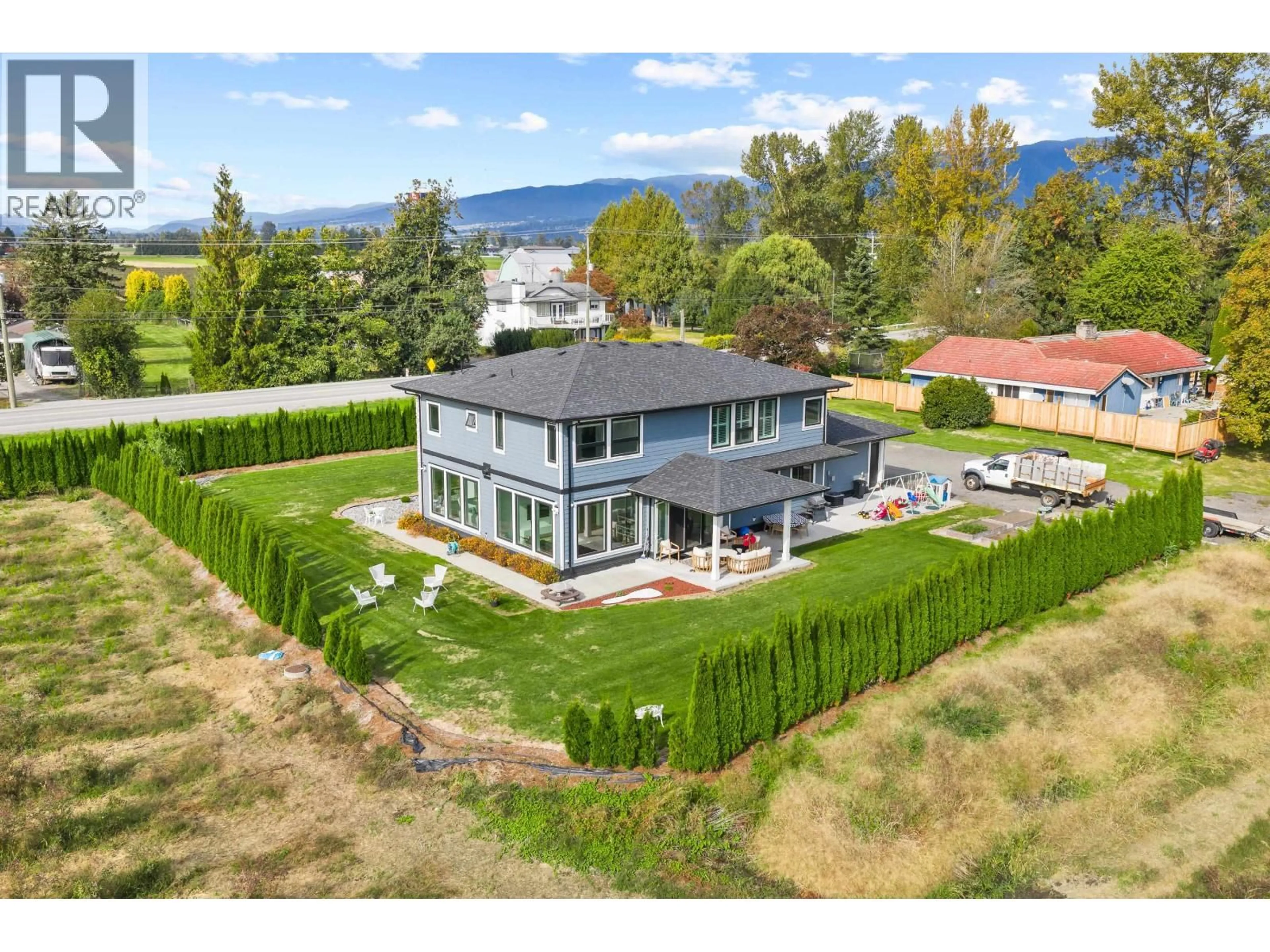 A pic from outside/outdoor area/front of a property/back of a property/a pic from drone, water/lake/river/ocean view for 13540 NEAVES ROAD, Pitt Meadows British Columbia V3Y0A8