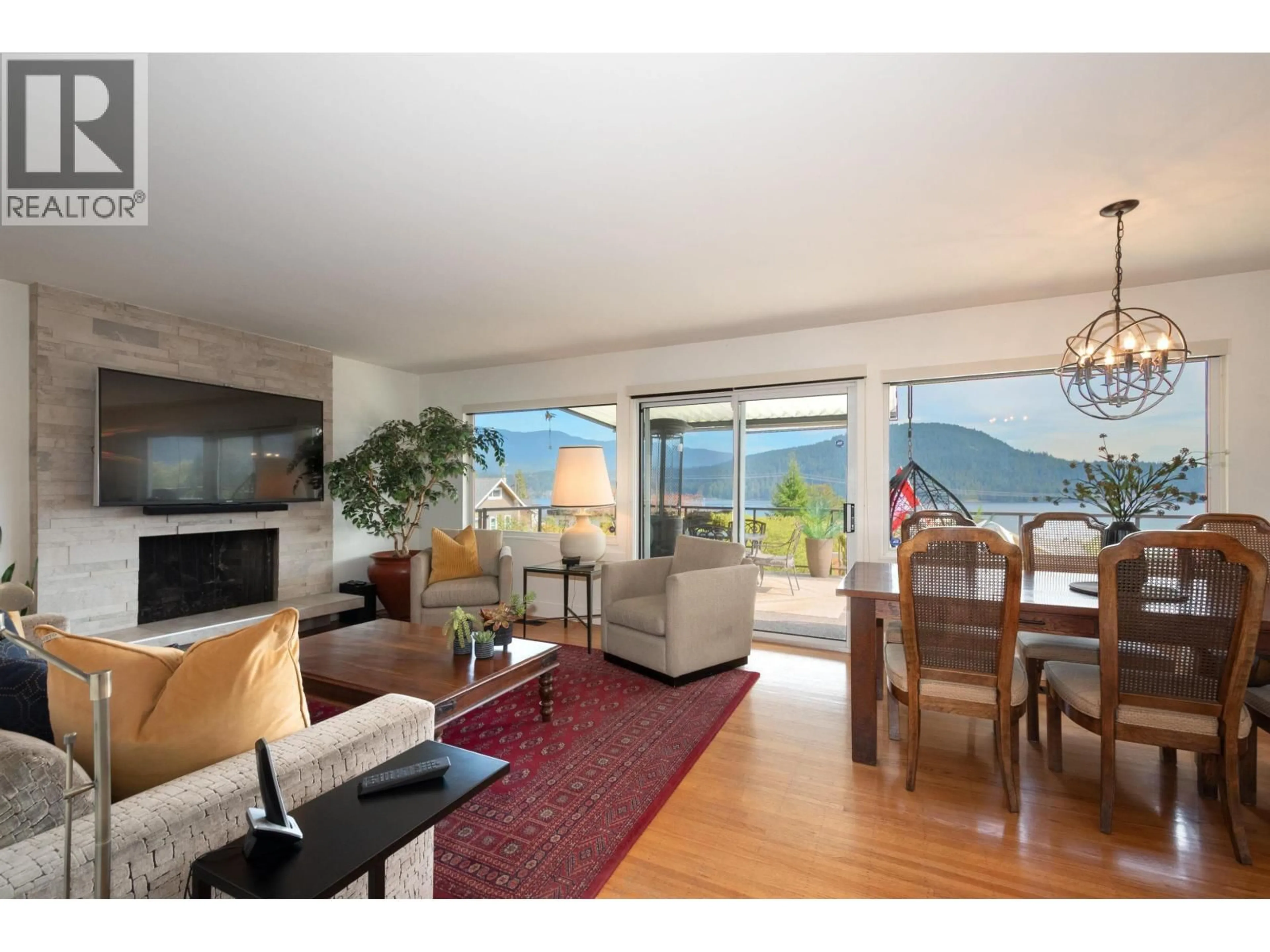 Living room with furniture, wood/laminate floor for 4300 DOLLAR ROAD, North Vancouver British Columbia V7G2T4