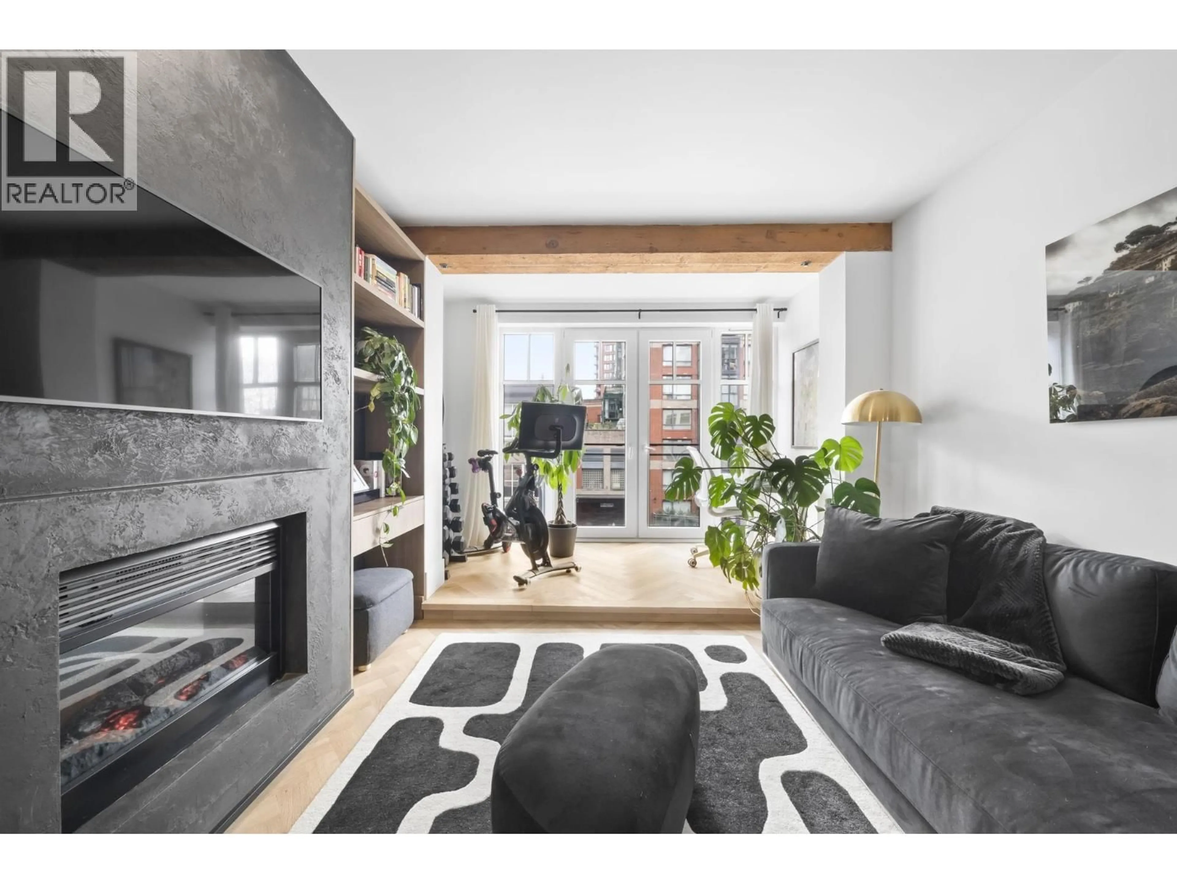 Living room with furniture, unknown for 202 - 1275 HAMILTON STREET, Vancouver British Columbia V6B1E2